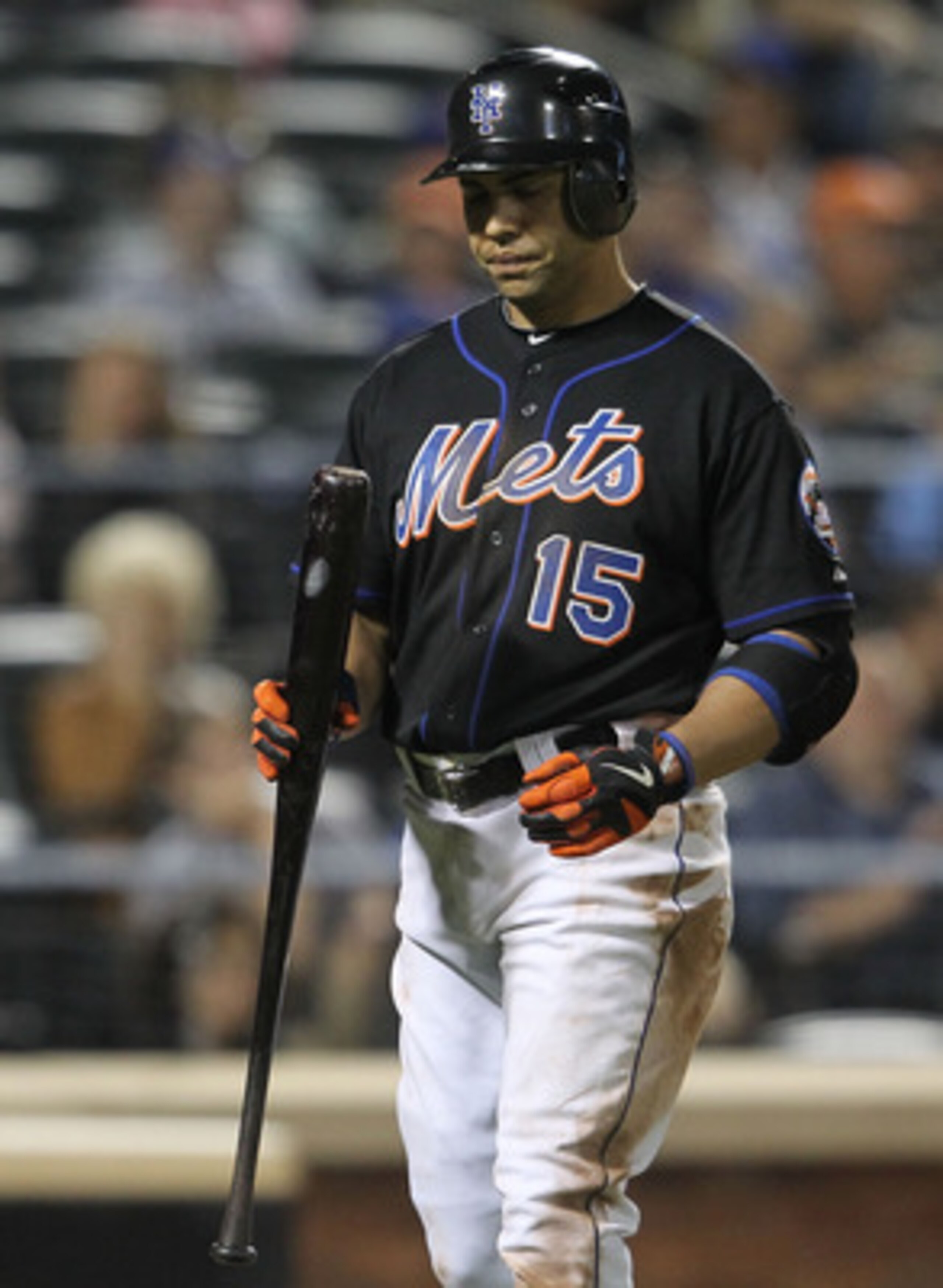 NEW YORK, NY - JUNE 03: Carlos Beltran #15 of the New York Mets walks to the dugout after striking out against the Atlanta Braves at Citi Field on June 3, 2011 in the Flushing neighborhood of the Queens borough of New York City.  (Photo by Nick Laham/Gett