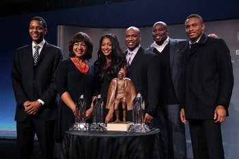 DALLAS, TX - FEBRUARY 04:  Walter Payton NFL Man of the Year Award finalists Nnamdi Asomugha (R) of the Oakland Raiders and Israel Idonije (2ndR) of the Chicago Bears pose with the Peyton family, Connie Payton (2ndL), wife of former Chicago Bears great Wa