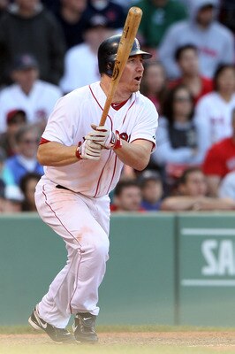 BOSTON, MA - JUNE 04:  J.D. Drew #7 of the Boston Red Sox watches his game winning hit in the bottom of the 14th inning to score teammate Carl Crawford on June 4, 2011 at Fenway Park in Boston, Massachusetts. The Boston Red Sox defeated the Oakland Athlet