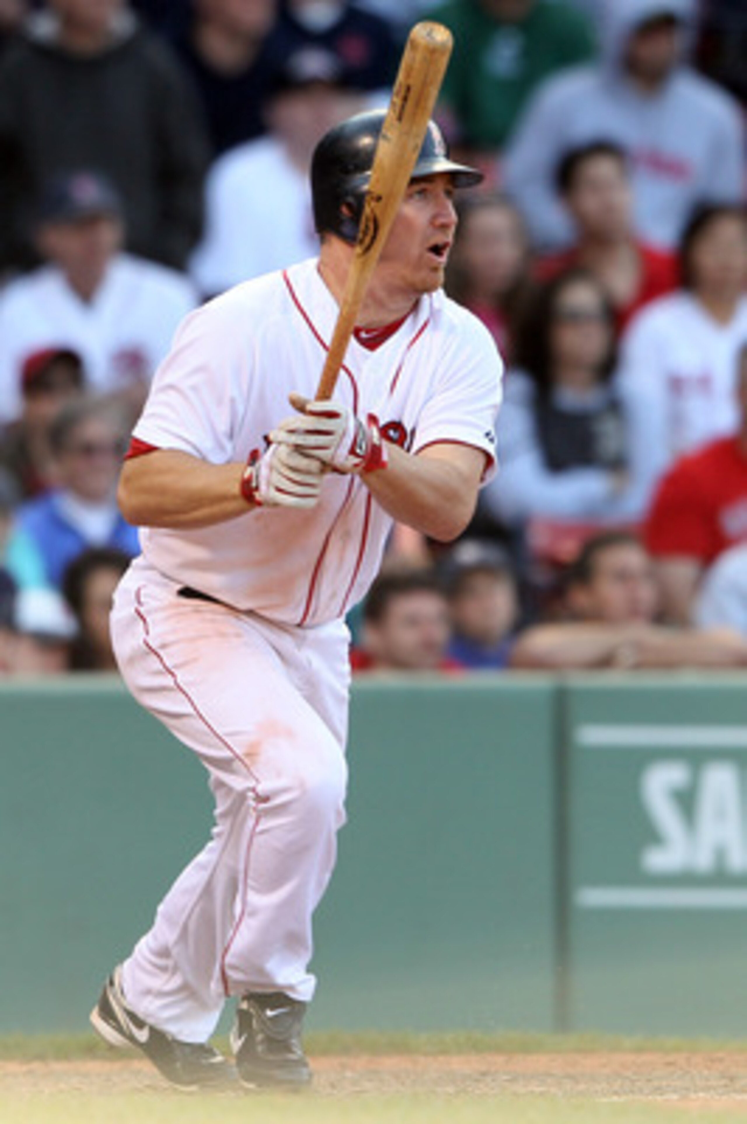 BOSTON, MA - JUNE 04:  J.D. Drew #7 of the Boston Red Sox watches his game winning hit in the bottom of the 14th inning to score teammate Carl Crawford on June 4, 2011 at Fenway Park in Boston, Massachusetts. The Boston Red Sox defeated the Oakland Athlet