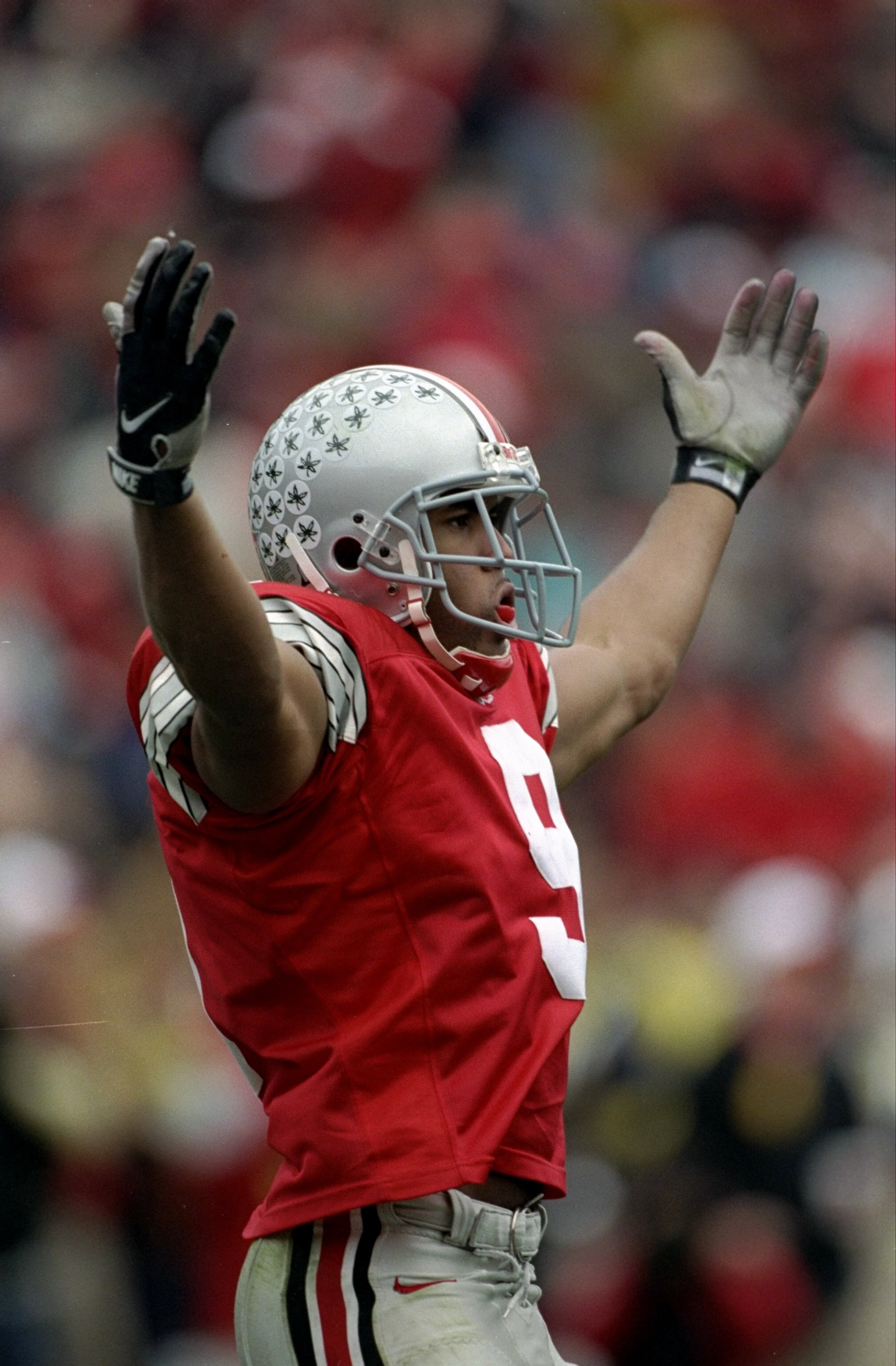 21 Nov 1998: David Boston #9 of Ohio State celebrates during the game against the Michigan Wolverines at Ohio Stadium in Columbus, Ohio. Ohio State defeated Michigan 31-16. Mandatory Credit: Rick Stewart  /Allsport