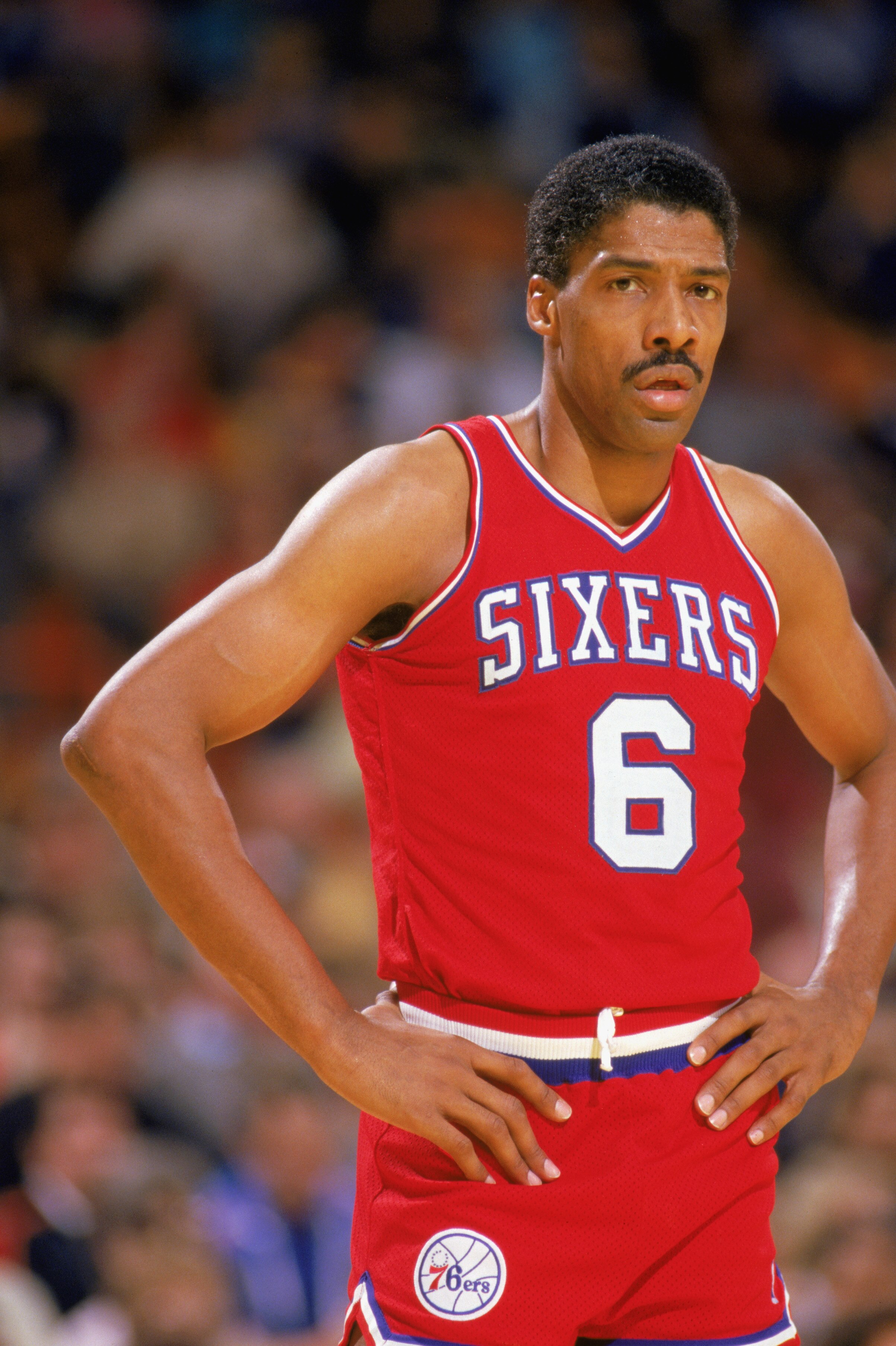 LOS ANGELES - 1987:  Julius Erving #6 of the Philadelphia 76ers rests during the 1987 game against the Los Angeles Lakers at the Great Western Forum in Los Angeles, California.  (Photo by Stephen Dunn/Getty Images)