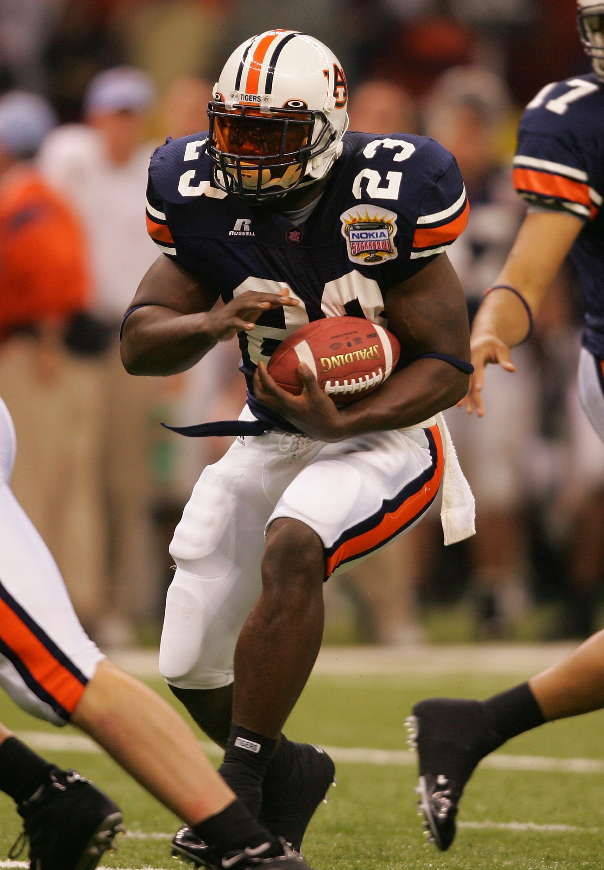 NEW ORLEANS - JANUARY 03:  Running back Ronnie Brown #23 of the Auburn Tigers runs with the ball against the Virginia Tech Hokies during the Nokia Sugar Bowl on January 3, 2005 at the Superdome in New Orleans, Louisiana.  (Photo by Matthew Stockman/Getty