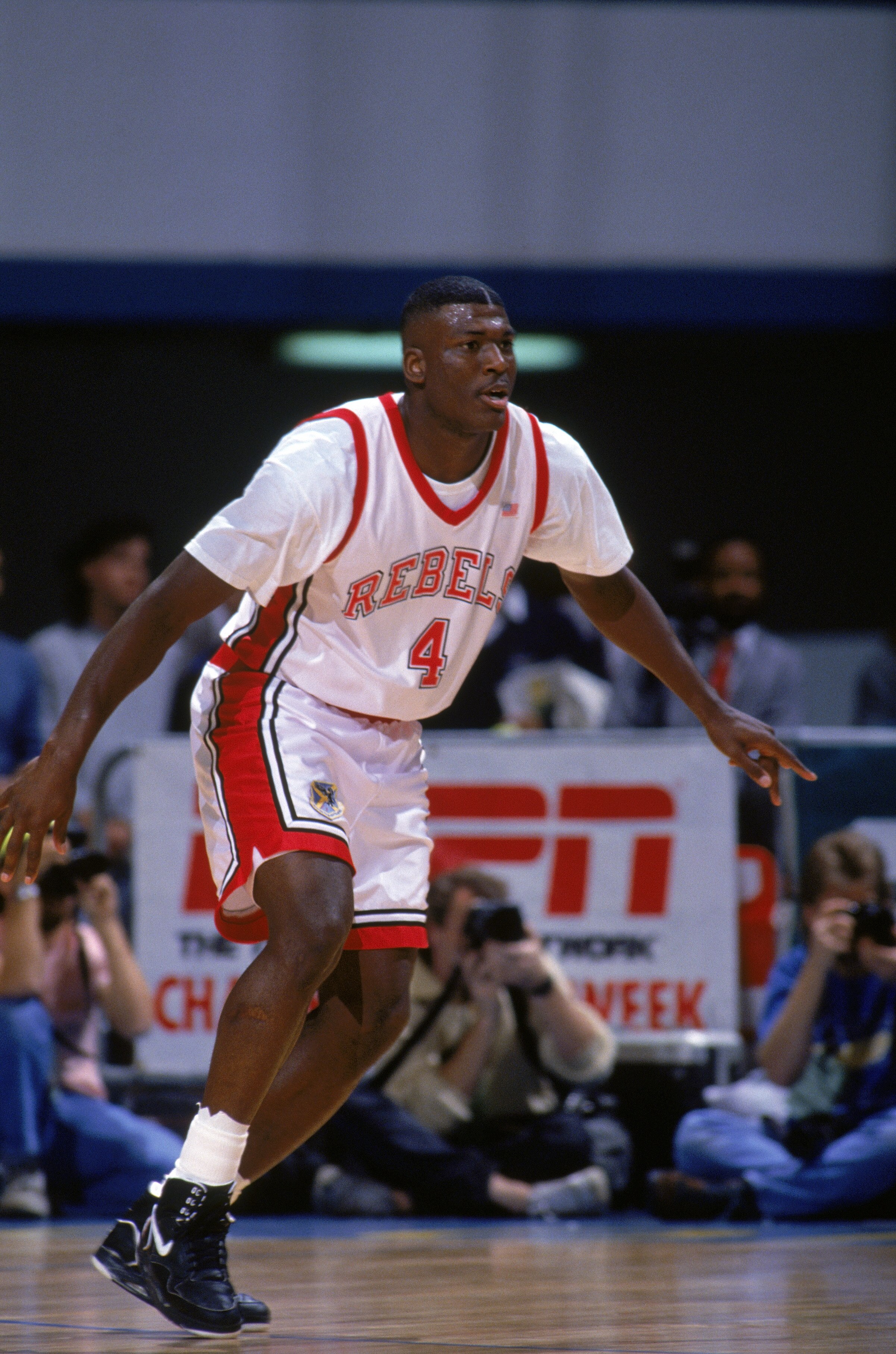 MARCH - 1991:  Larry Johnson #4 of the University of Las Vegas Nevada Rebels plays defense during an NCAA game against Cal State Long Beach in March of 1991.  (Photo by Ken Levine/Getty Images)
