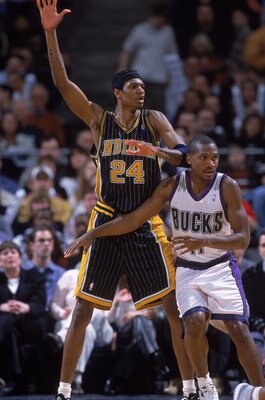 3 Feb 2001:  Jonathan Bender #24 of the Indiana Pacers waves to prove he is open against Lindsey Hunter #11 of the Milwaukee Bucks during the game at the Bradley Center in Milwaukee, Wisconsin. The Bucks defeated the Pacers 104-85.  NOTE TO USER: It is ex