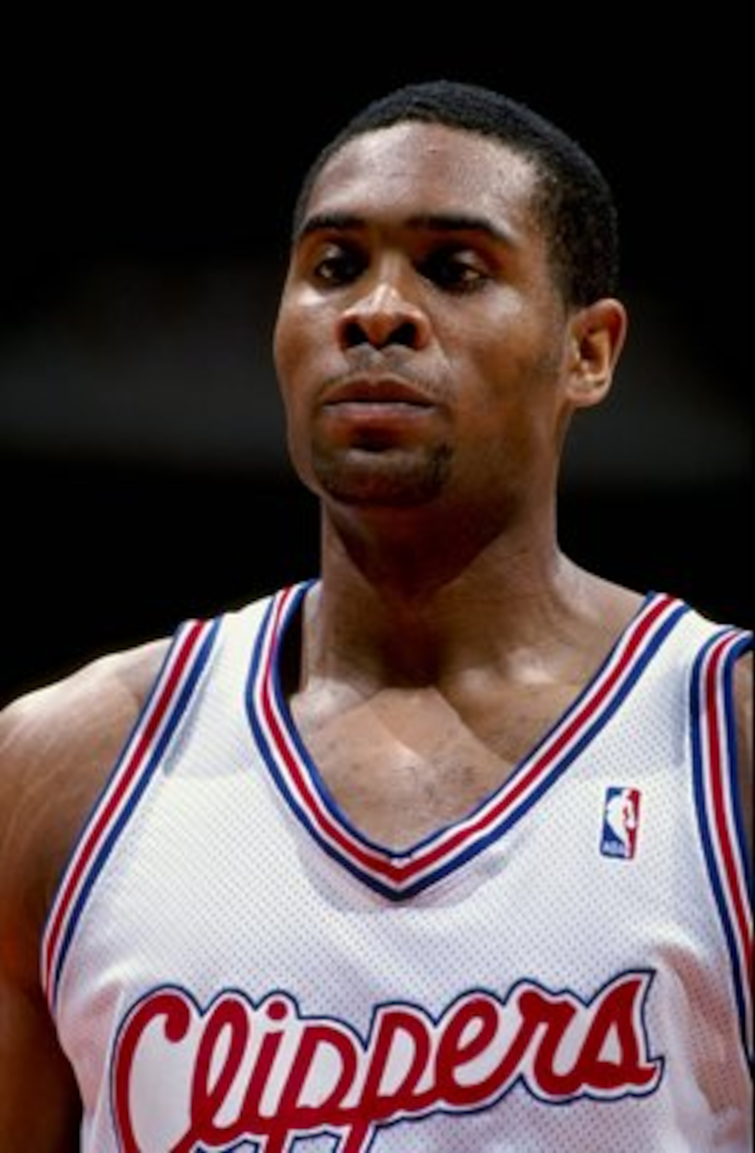 16 Feb 1999: Michael Olowokandi #34 of the Los Angeles Clippers looks on during the game against the Vancouver Grizzles at the Arrowhead Pond in Anaheim, California. The Grizzles defeated the Clippers 93-89.