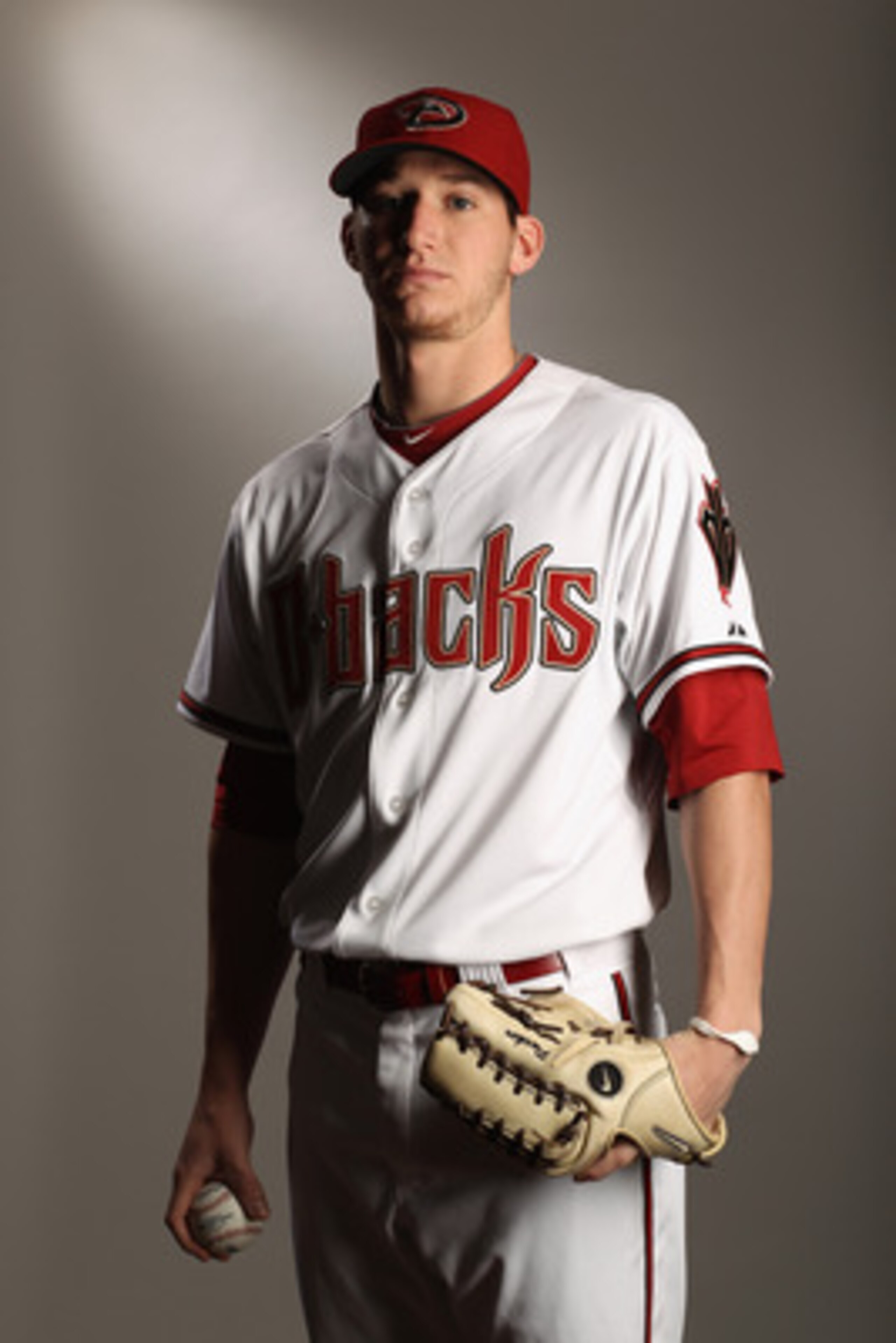SCOTTSDALE, AZ - FEBRUARY 21:  Jarrod Parker #61 of the Arizona Diamondbacks poses for a portrait at Salt River Fields at Talking Stick on February 21, 2011 in Scottsdale, Arizona.  (Photo by Ezra Shaw/Getty Images)