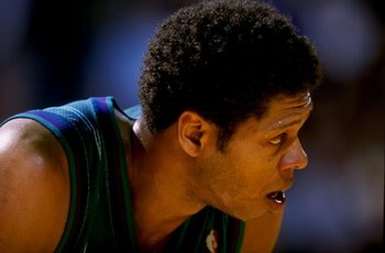 16 Feb 1999: J.R. Reid #7 of the Charlotte Hornets rests as he looks on during the game against the Los Angeles Lakers at the Great Western Forum in Inglewood, California. The Lakers defeated the Hornets 116-88.  Mandatory Credit: Vincent Laforet  /Allspo