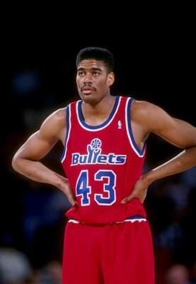 1993:  Center Pervis Ellison of the Washington Bullets stands on the court during a game against the Denver Nuggets at the McNichols Sports Arena in Denver, Colorado.   Mandatory Credit: Tim de Frisco  /Allsport