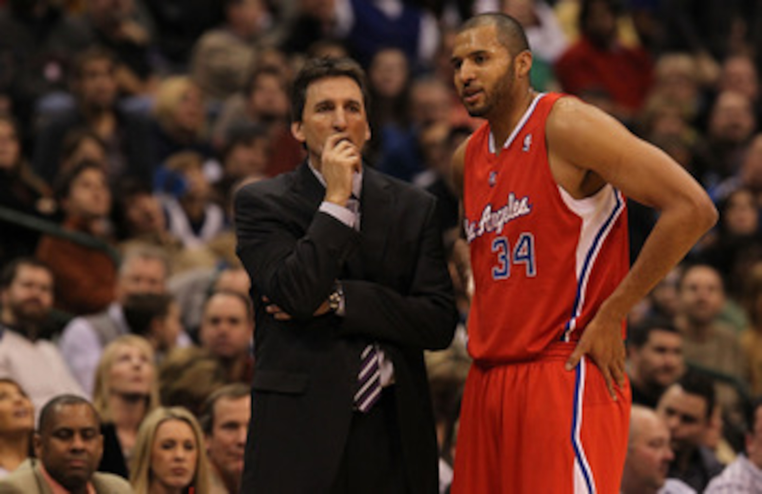 DALLAS, TX - JANUARY 25: Head coach Vinny Del Negro and Brian Cook #34 of the Los Angeles Clippers at American Airlines Center on January 25, 2011 in Dallas, Texas. NOTE TO USER: User expressly acknowledges and agrees that, by downloading and or using t DALLAS, TX - JANUARY 25: Head coach Vinny Del Negro and Brian Cook #34 of the Los Angeles Clippers at American Airlines Center on January 25, 2011 in Dallas, Texas. NOTE TO USER: User expressly acknowledges and agrees that, by downloading and or using t