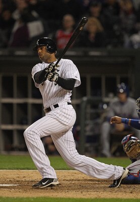 CHICAGO, IL - MAY 17: Alex Rios #51 of the Chicago White Sox hits the ball against the Texas Rangers at U.S. Cellular Field on May 17, 2011 in Chicago, Illinois. The White Sox defeated the Rangers 4-3.  (Photo by Jonathan Daniel/Getty Images)