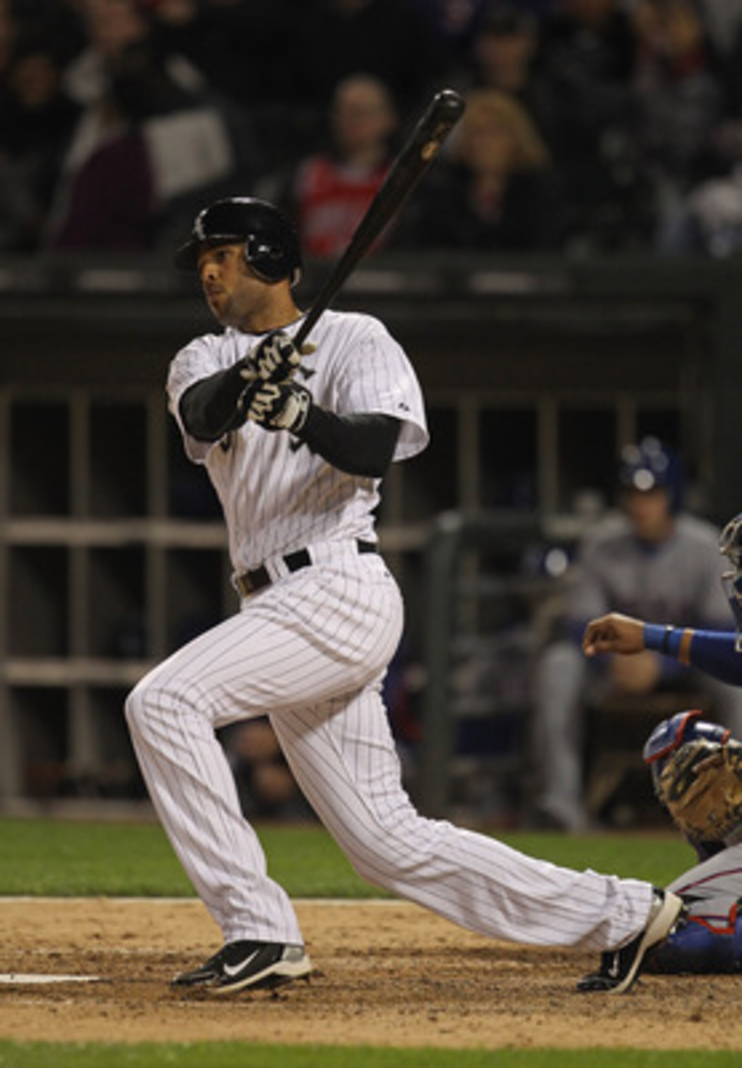 CHICAGO, IL - MAY 17: Alex Rios #51 of the Chicago White Sox hits the ball against the Texas Rangers at U.S. Cellular Field on May 17, 2011 in Chicago, Illinois. The White Sox defeated the Rangers 4-3.  (Photo by Jonathan Daniel/Getty Images)