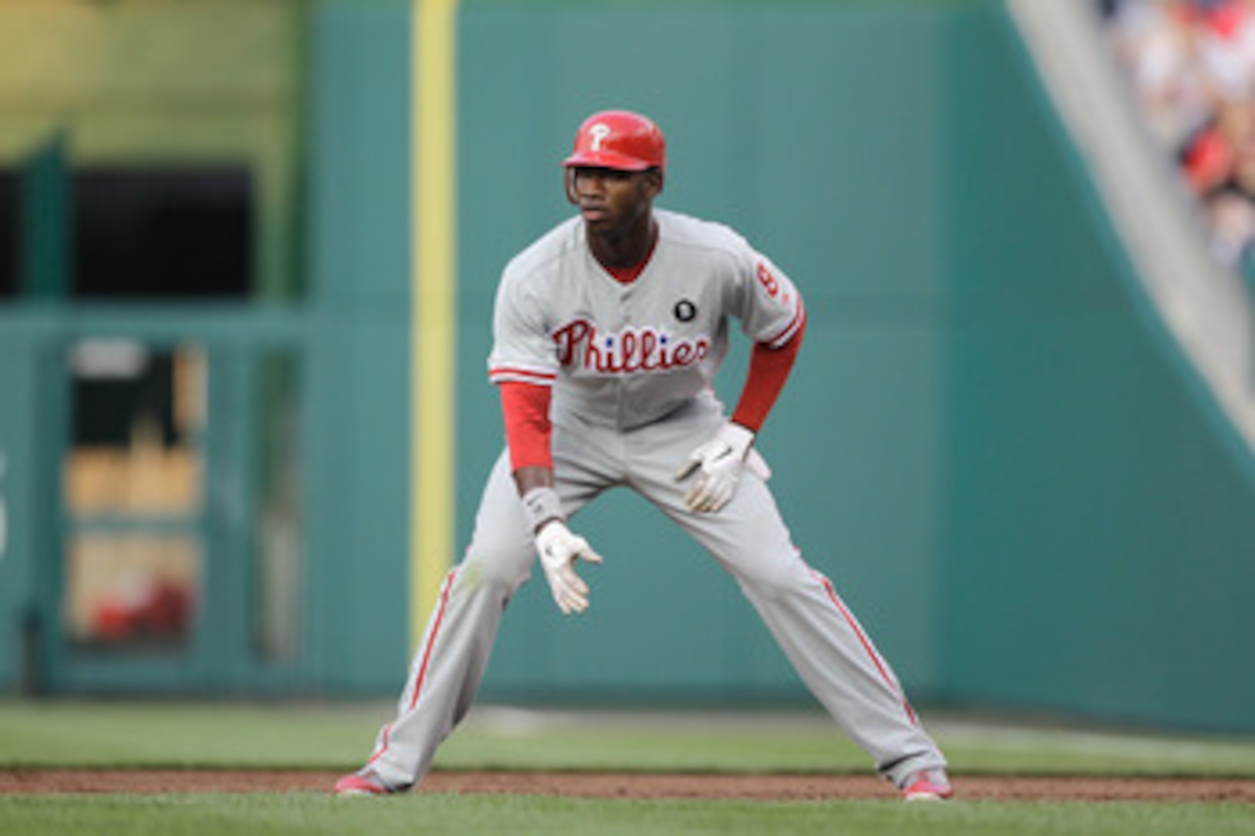 WASHINGTON, DC - MAY 31:  Domonic Brown #9 of the Philadelphia Phillies on the bases against the Washington Nationals at Nationals Park on May 31, 2011 in Washington, DC. The Braves won 2-0. (Photo by Rob Carr/Getty Images)