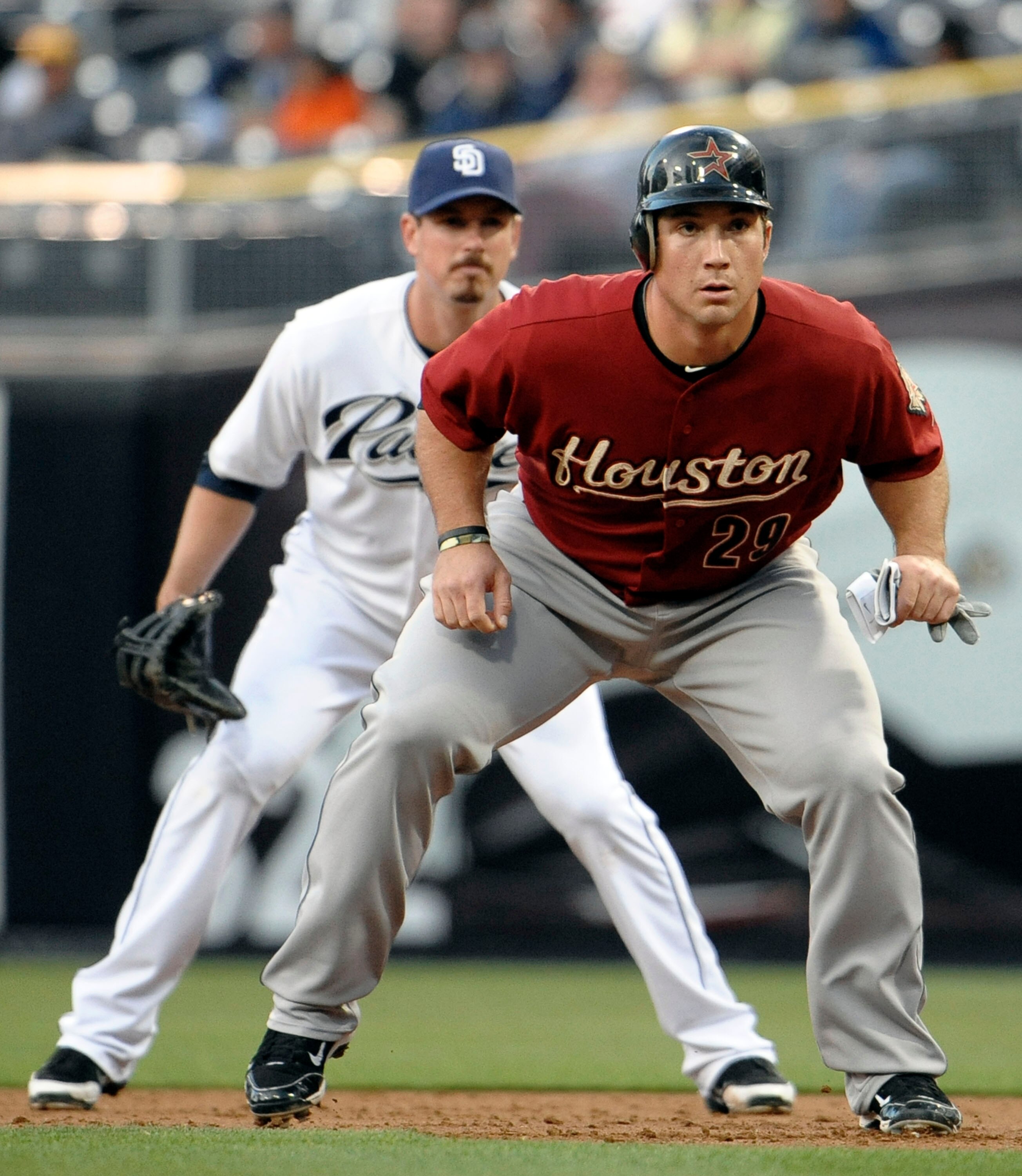 SAN DIEGO, CA - JUNE 2: Brett Wallace #29 of the Houston Astros leads off in front of Brad Hawpe #11 of the San Diego Padres during the second inning at Petco Park on June 2, 2011 in San Diego, California.  (Photo by Denis Poroy/Getty Images)