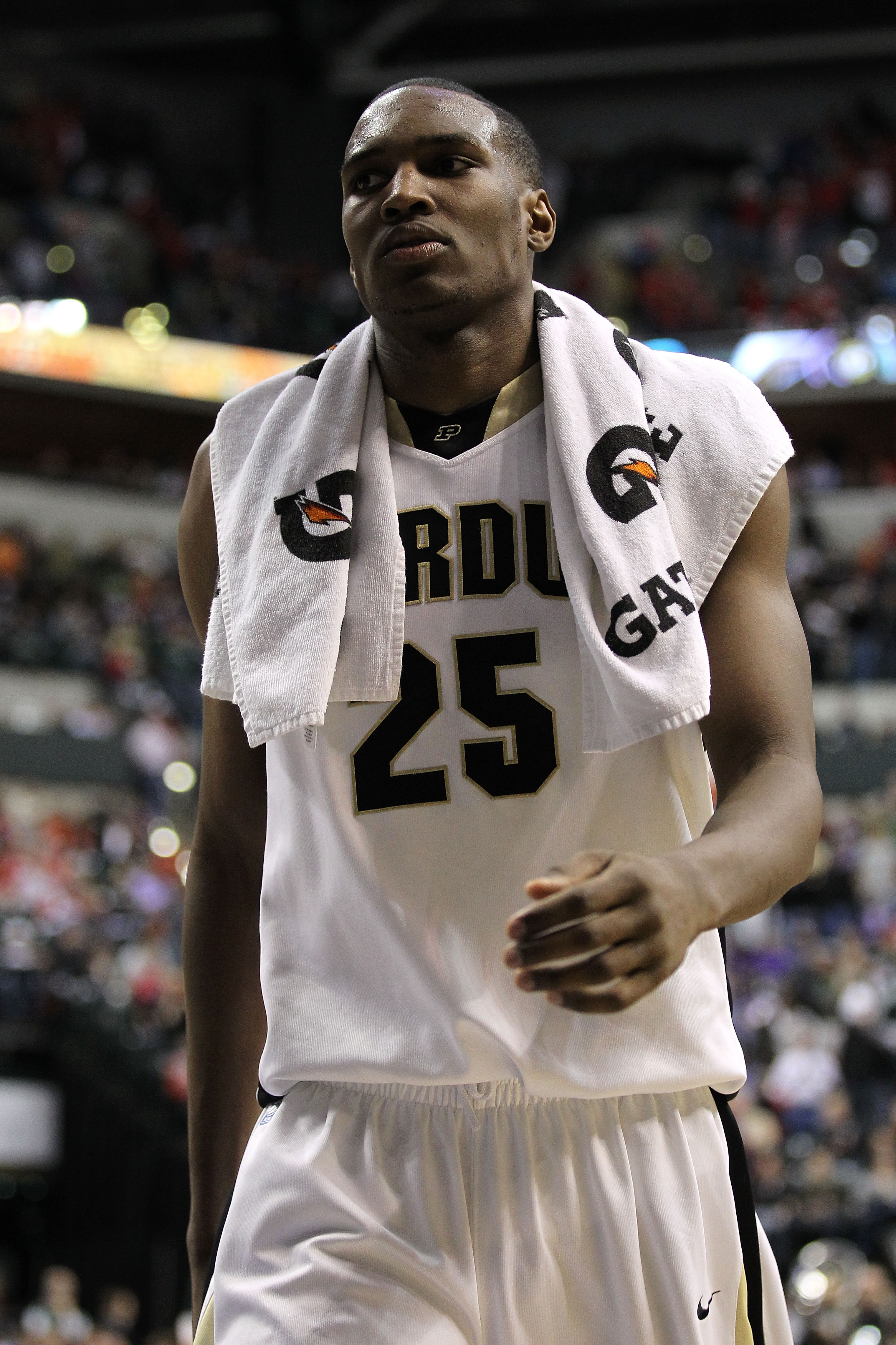INDIANAPOLIS, IN - MARCH 11:  JaJuan Johnson #25 of the Purdue Boilermakers walks off the court dejected after they lost 74-56 against the Michigan State Spartans during the quarterfinals of the 2011 Big Ten Men's Basketball Tournament at Conseco Fieldhou