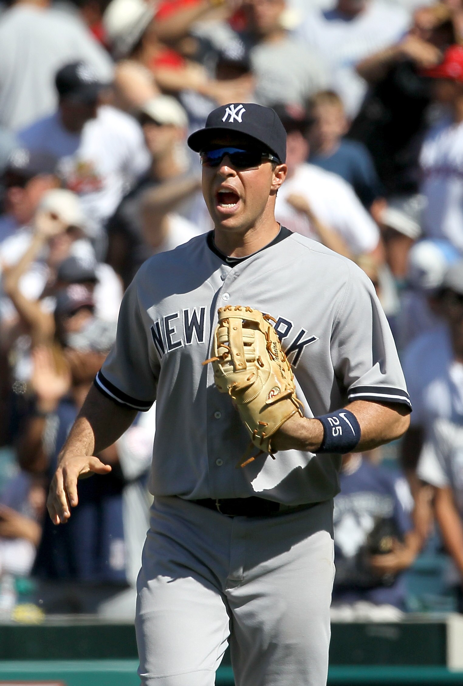 ANAHEIM, CA - JUNE 05:  Mark Teixeira #25 of the New York Yankees celebrates after the game with the Los Angeles Angels of Anaheim on June 5, 2011 at Angel Stadium in Anaheim, California.  The Yankees won 5-3.  (Photo by Stephen Dunn/Getty Images)