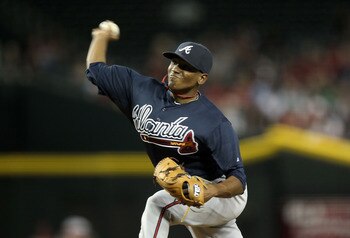 PHOENIX, AZ - MAY 18:  Starting pitcher Julio Teheran #57 of the Atlanta Braves pitches against the Arizona Diamondbacks during the Major League Baseball game at Chase Field on May 18, 2011 in Phoenix, Arizona.  The Diamondbacks defeated the Braves 5-4 in