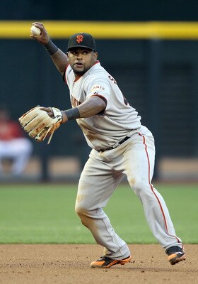 PHOENIX, AZ - APRIL 16:  Infielder Pablo Sandoval #48 of the San Francisco Giants fields a ground ball out during the Major League Baseball game against the Arizona Diamondbacks at Chase Field on April 16, 2011 in Phoenix, Arizona.  The Giants defeated th