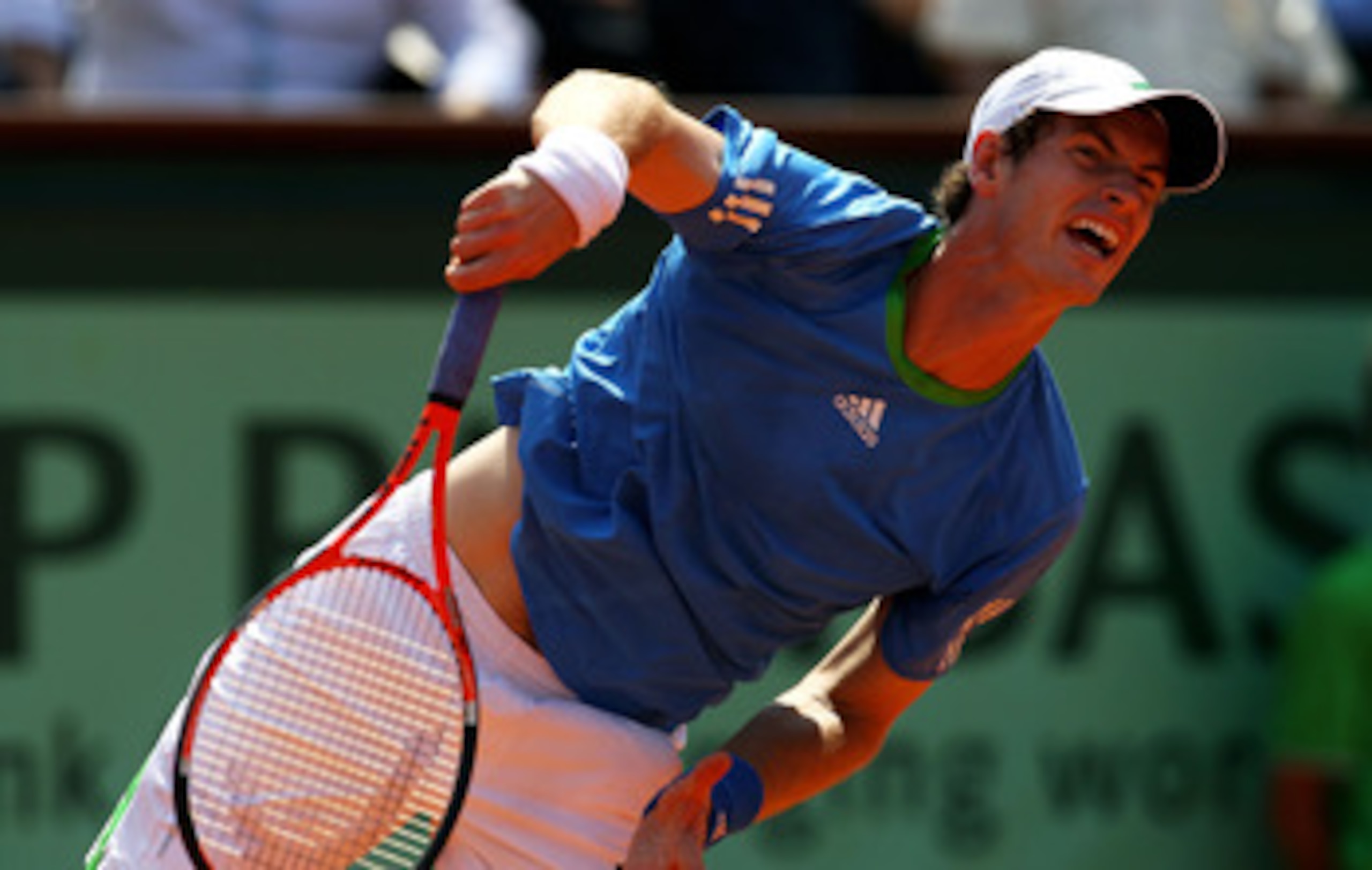 PARIS, FRANCE - JUNE 03: Andy Murray of Great Britain serves during the men's singles semi final match between Rafael Nadal of Spain and Andy Murray of Great Britain on day thirteen of the French Open at Roland Garros on June 3, 2011 in Paris, France. ( PARIS, FRANCE - JUNE 03: Andy Murray of Great Britain serves during the men's singles semi final match between Rafael Nadal of Spain and Andy Murray of Great Britain on day thirteen of the French Open at Roland Garros on June 3, 2011 in Paris, France. (