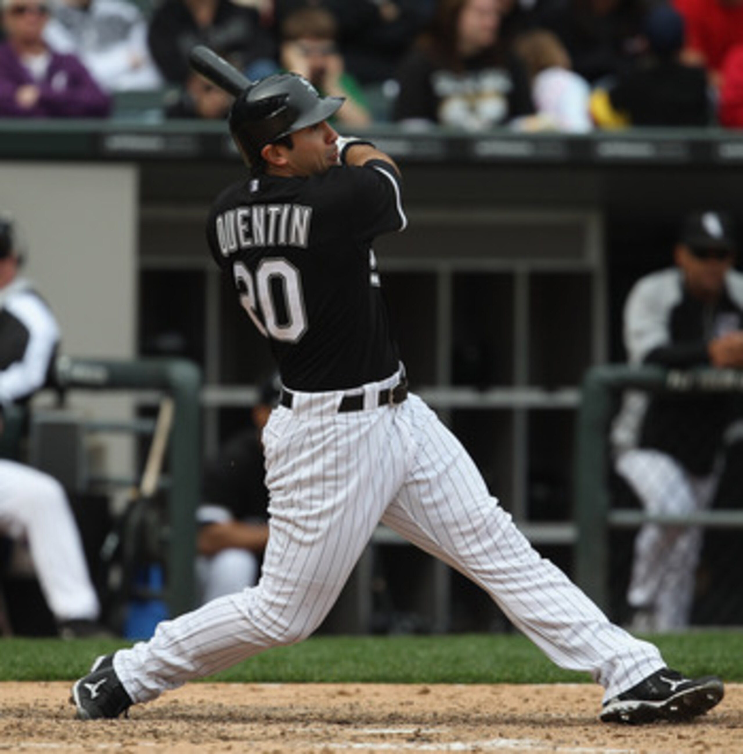 CHICAGO, IL - MAY 01: Carlos Quentin #20 of the Chicago White Sox hits the ball against the Baltimore Orioles at U.S. Cellular Field on May 1, 2011 in Chicago, Illinois. The Orioles defeated the White Sox 6-4. (Photo by Jonathan Daniel/Getty Images)