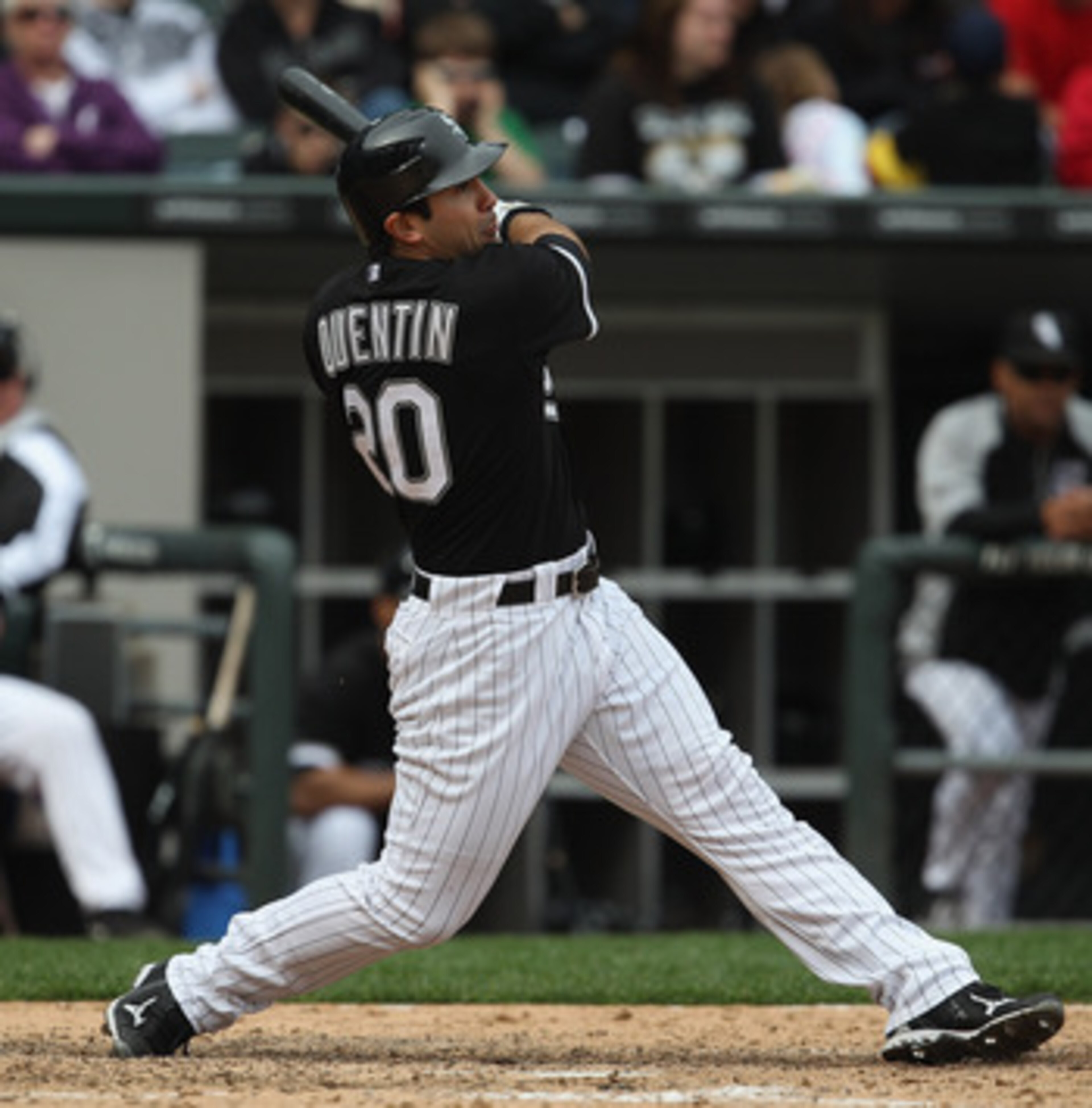 CHICAGO, IL - MAY 01: Carlos Quentin #20 of the Chicago White Sox hits the ball against the Baltimore Orioles at U.S. Cellular Field on May 1, 2011 in Chicago, Illinois. The Orioles defeated the White Sox 6-4. (Photo by Jonathan Daniel/Getty Images)