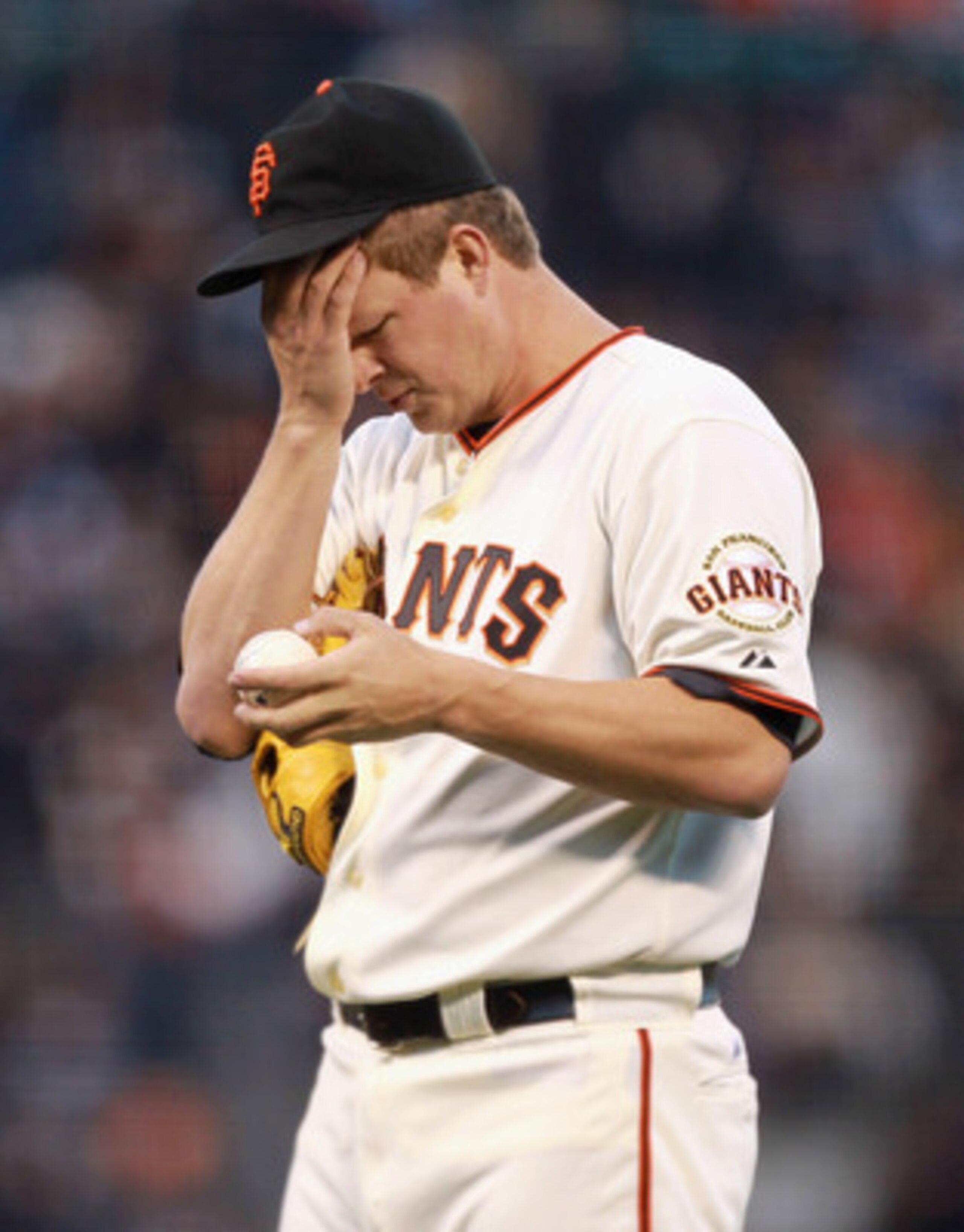 SAN FRANCISCO, CA - MAY 24:  Matt Cain #18 of the San Francisco Giants reacts after giving up three runs to the Florida Marlins in the third inning at AT&T Park on May 24, 2011 in San Francisco, California.  (Photo by Ezra Shaw/Getty Images)