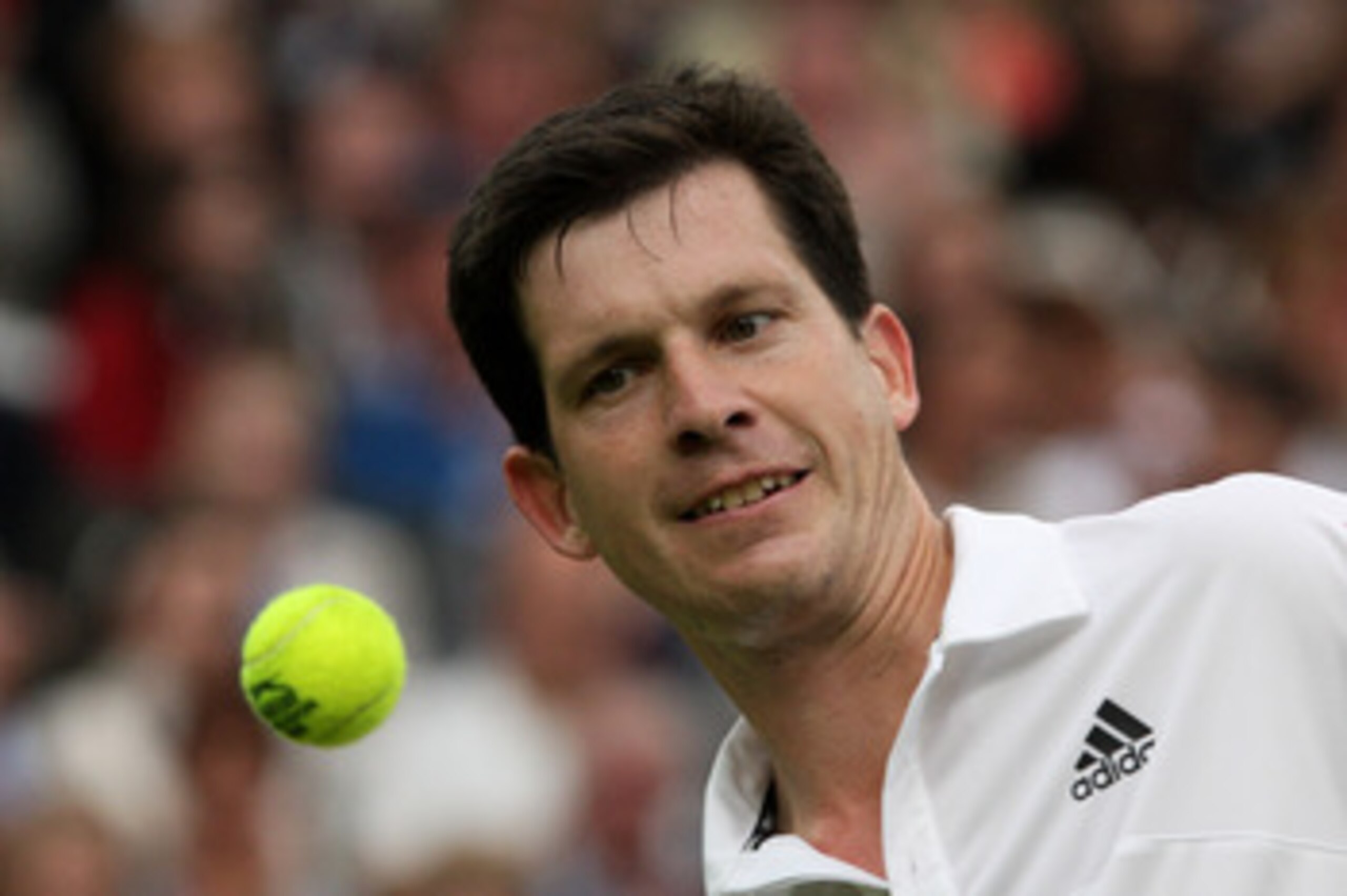LONDON, ENGLAND - MAY 17: Tim Henman watches the ball during the Mens Singles match against Andre Agassi during the 'Centre Court Celebration' at Wimbledon on May 17, 2009 in London, England. (Photo by Hamish Blair/Getty Images) LONDON, ENGLAND - MAY 17: Tim Henman watches the ball during the Mens Singles match against Andre Agassi during the 'Centre Court Celebration' at Wimbledon on May 17, 2009 in London, England. (Photo by Hamish Blair/Getty Images)