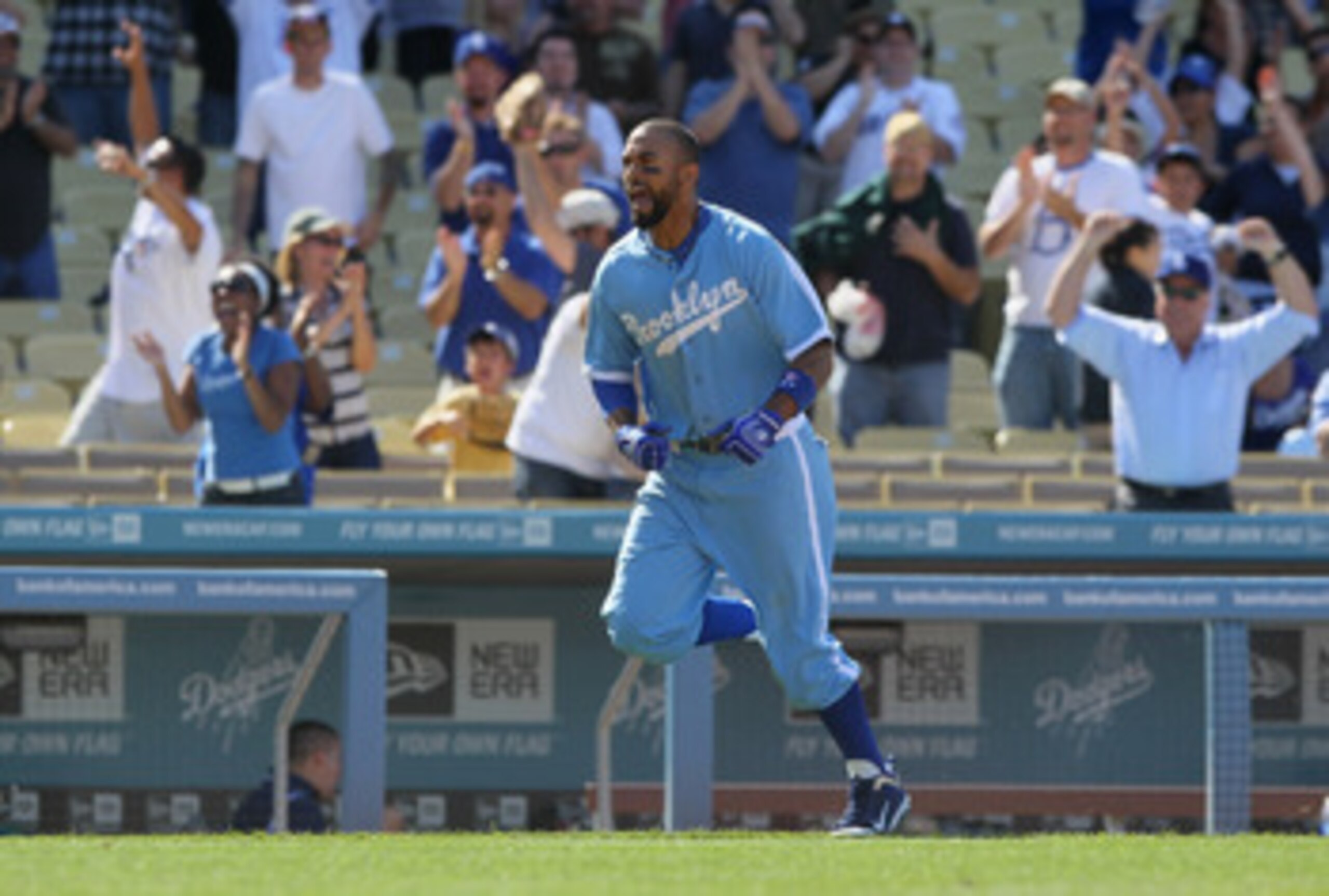 LOS ANGELES, CA - APRIL 21:  Matt Kemp #27 of the Los Angeles Dodgers celebrates after hitting the game winning two-run home run in the 12th inning against the Atlanta Braves at Dodger Stadium on April 21, 2011 in Los Angeles, California. The Dodgers defe
