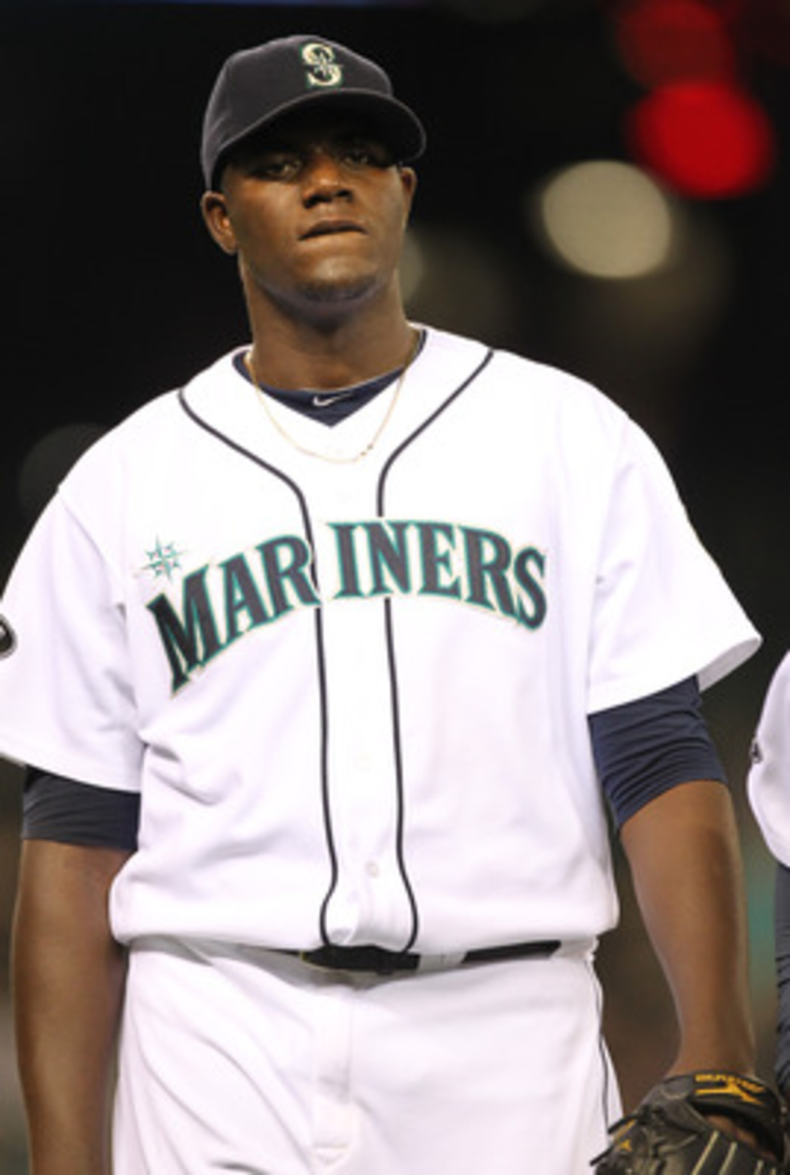 SEATTLE - MAY 04:  Starting pitcher Michael Pineda #36 of the Seattle Mariners heads back to the dugout after retiring the side against the Texas Rangers at Safeco Field on May 4, 2011 in Seattle, Washington. (Photo by Otto Greule Jr/Getty Images)
