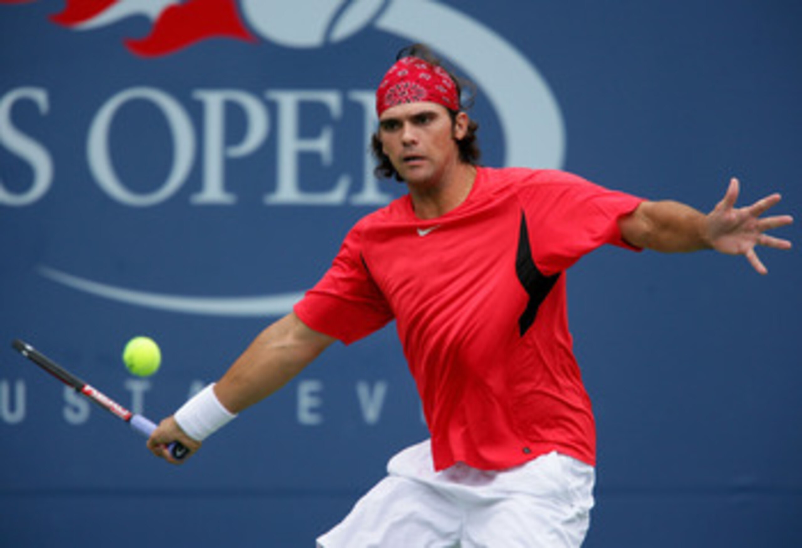 NEW YORK - AUGUST 30: Mark Philippoussis of Australia returns a shot during his match against Rafael Nadal of Spain during the U.S. Open at the USTA Billie Jean King National Tennis Center in Flushing Meadows Corona Park on August 30, 2006 in the Flushin NEW YORK - AUGUST 30: Mark Philippoussis of Australia returns a shot during his match against Rafael Nadal of Spain during the U.S. Open at the USTA Billie Jean King National Tennis Center in Flushing Meadows Corona Park on August 30, 2006 in the Flushin