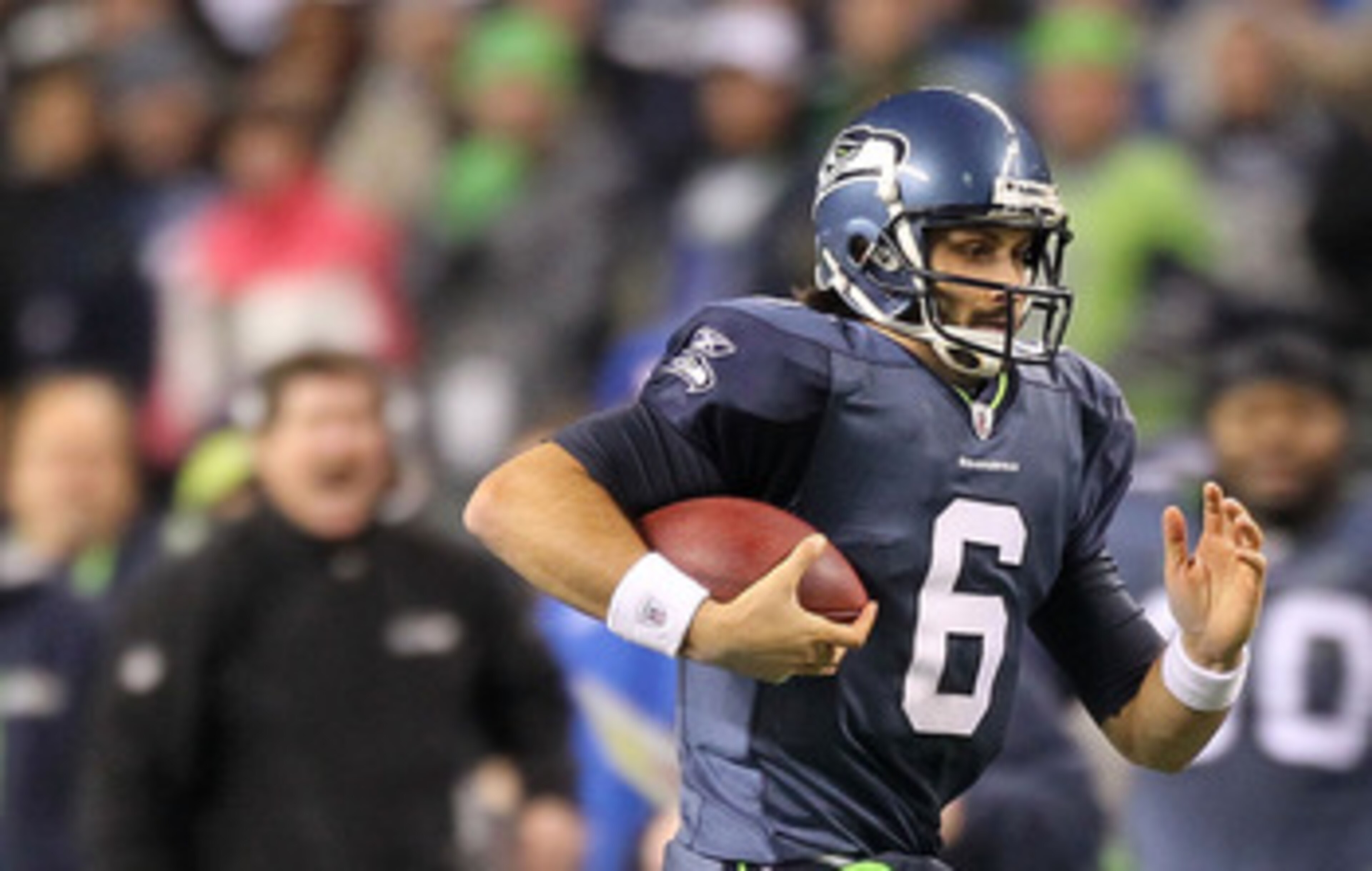 SEATTLE, WA - JANUARY 02: Quarterback Charlie Whitehurst #6 of the Seattle Seahawks runs with the ball during their game against the St. Louis Rams at Qwest Field on January 2, 2011 in Seattle, Washington. (Photo by Otto Greule Jr/Getty Images) SEATTLE, WA - JANUARY 02: Quarterback Charlie Whitehurst #6 of the Seattle Seahawks runs with the ball during their game against the St. Louis Rams at Qwest Field on January 2, 2011 in Seattle, Washington. (Photo by Otto Greule Jr/Getty Images)