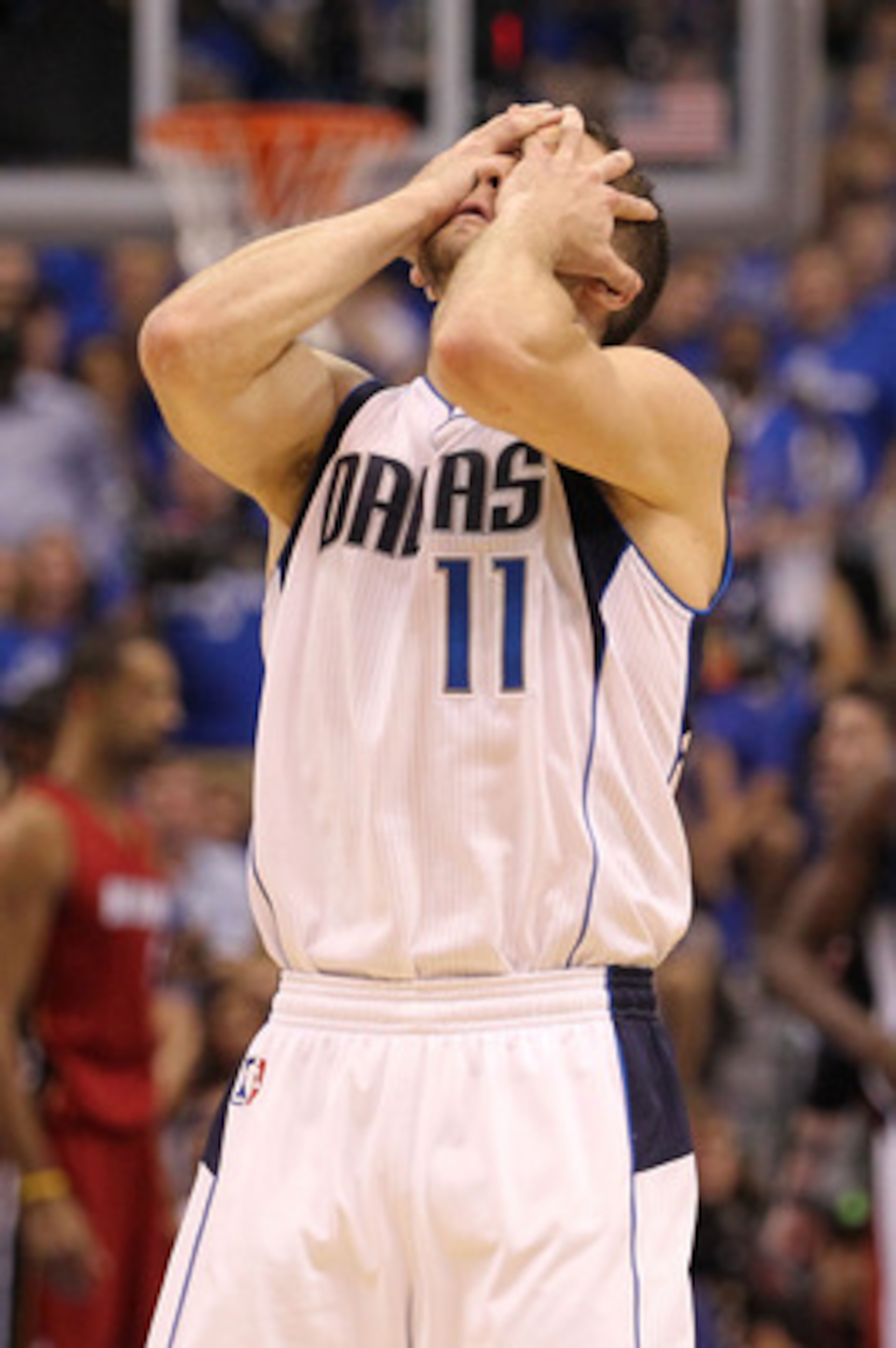 DALLAS, TX - JUNE 05:  Jose Juan Barea #11 of the Dallas Mavericks reacts against the Miami Heat in the second half of Game Three of the 2011 NBA Finals at American Airlines Center on June 5, 2011 in Dallas, Texas.  NOTE TO USER: User expressly acknowledg