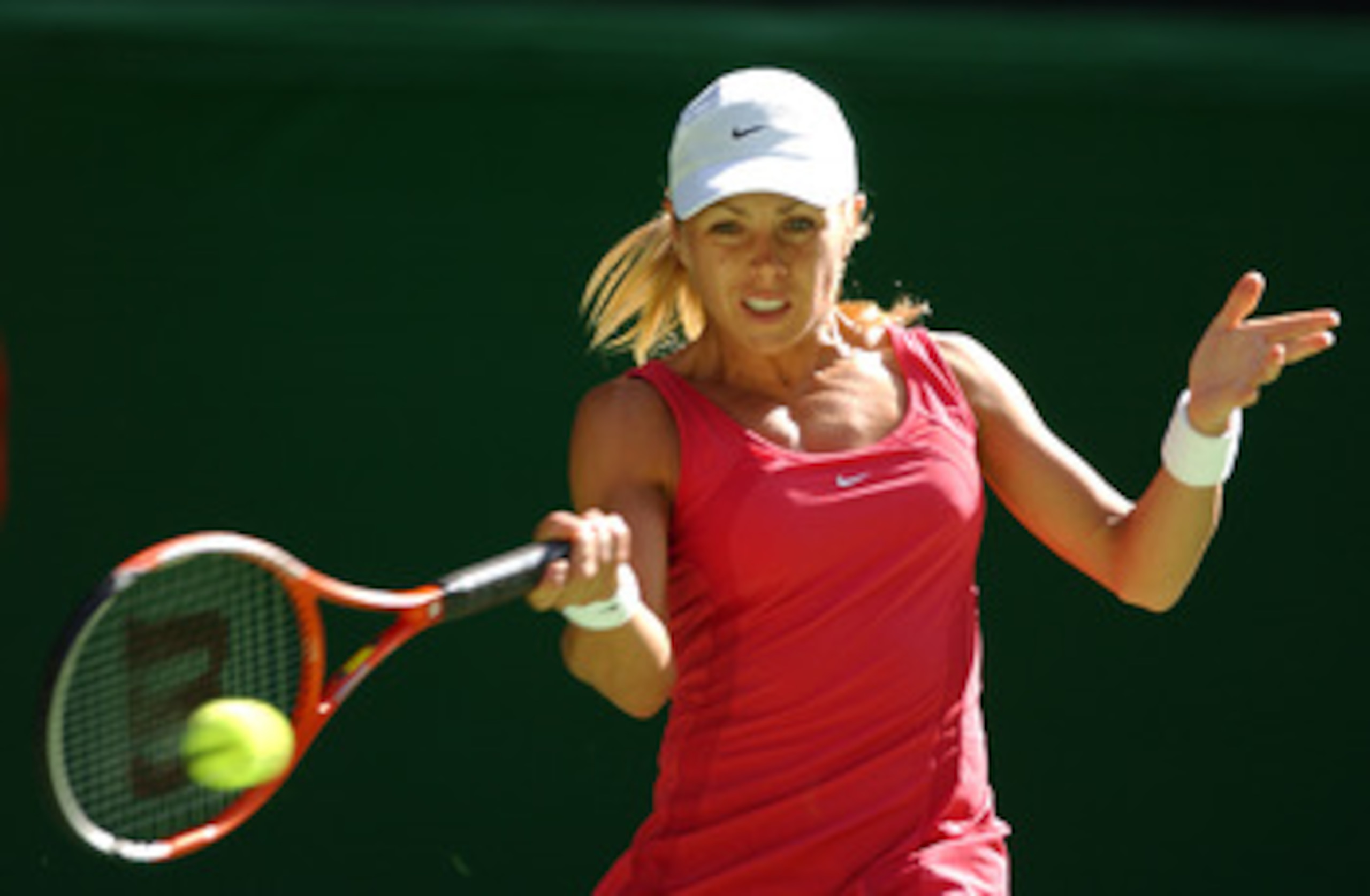 MELBOURNE - JANUARY 14: Amanda Coetzer of South Africa in action against Barbera Schett of Austria during the Australian Open Tennis Championships at Melbourne Park, Melbourne, Australia on January 14, 2003. (Photo by Clive Brunskill/Getty Images). MELBOURNE - JANUARY 14: Amanda Coetzer of South Africa in action against Barbera Schett of Austria during the Australian Open Tennis Championships at Melbourne Park, Melbourne, Australia on January 14, 2003. (Photo by Clive Brunskill/Getty Images).