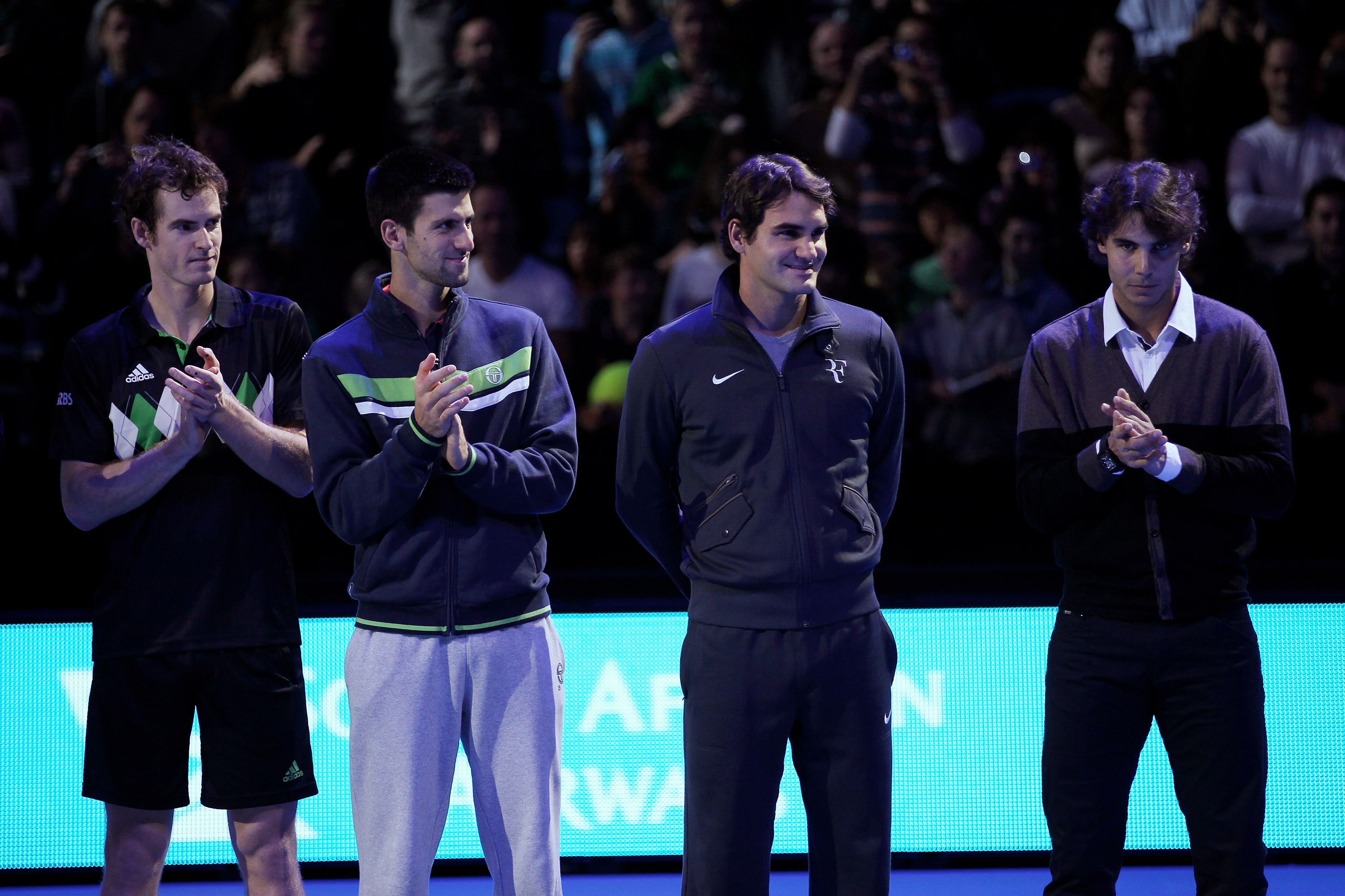 LONDON, ENGLAND - NOVEMBER 21:  (L-R) Andy Murray of Great Britain, Novak Djokovic of Siberia, Roger Federer of Switzerland and Rafael Nadal of Spain attend a ceremony for Carlos Moya's retirement during the Barclays ATP World Tour Finals at O2 Arena on N