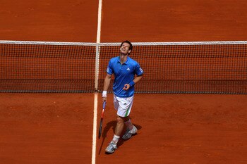 PARIS, FRANCE - MAY 28:  Andy Murray of Great Britain shouts out in frustration during the men's singles round three match between Andy Murray of Great Britain and Michael Berrer of Germany on day seven of the French Open at Roland Garros on May 28, 2011