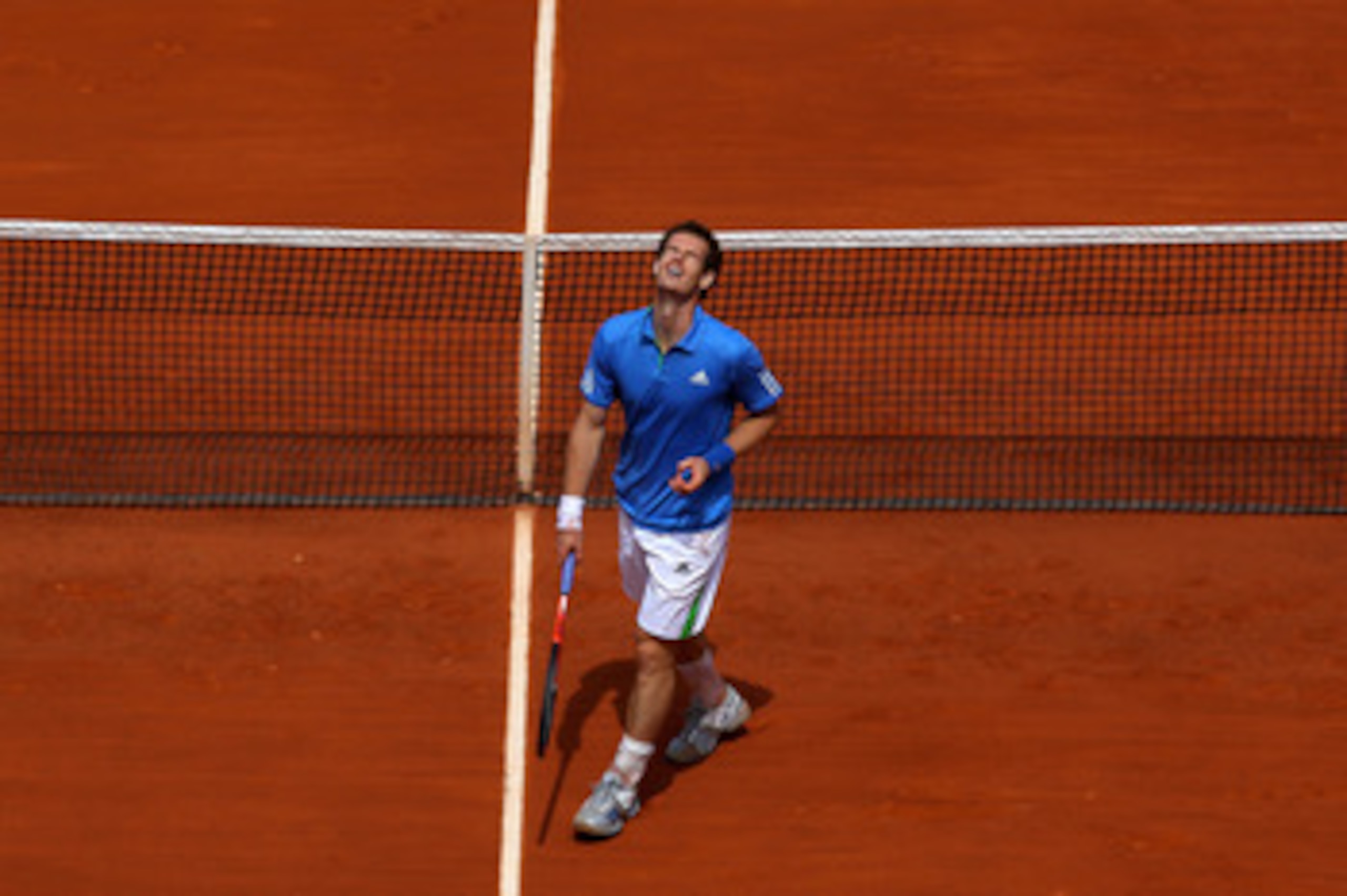 PARIS, FRANCE - MAY 28: Andy Murray of Great Britain shouts out in frustration during the men's singles round three match between Andy Murray of Great Britain and Michael Berrer of Germany on day seven of the French Open at Roland Garros on May 28, 2011 PARIS, FRANCE - MAY 28: Andy Murray of Great Britain shouts out in frustration during the men's singles round three match between Andy Murray of Great Britain and Michael Berrer of Germany on day seven of the French Open at Roland Garros on May 28, 2011