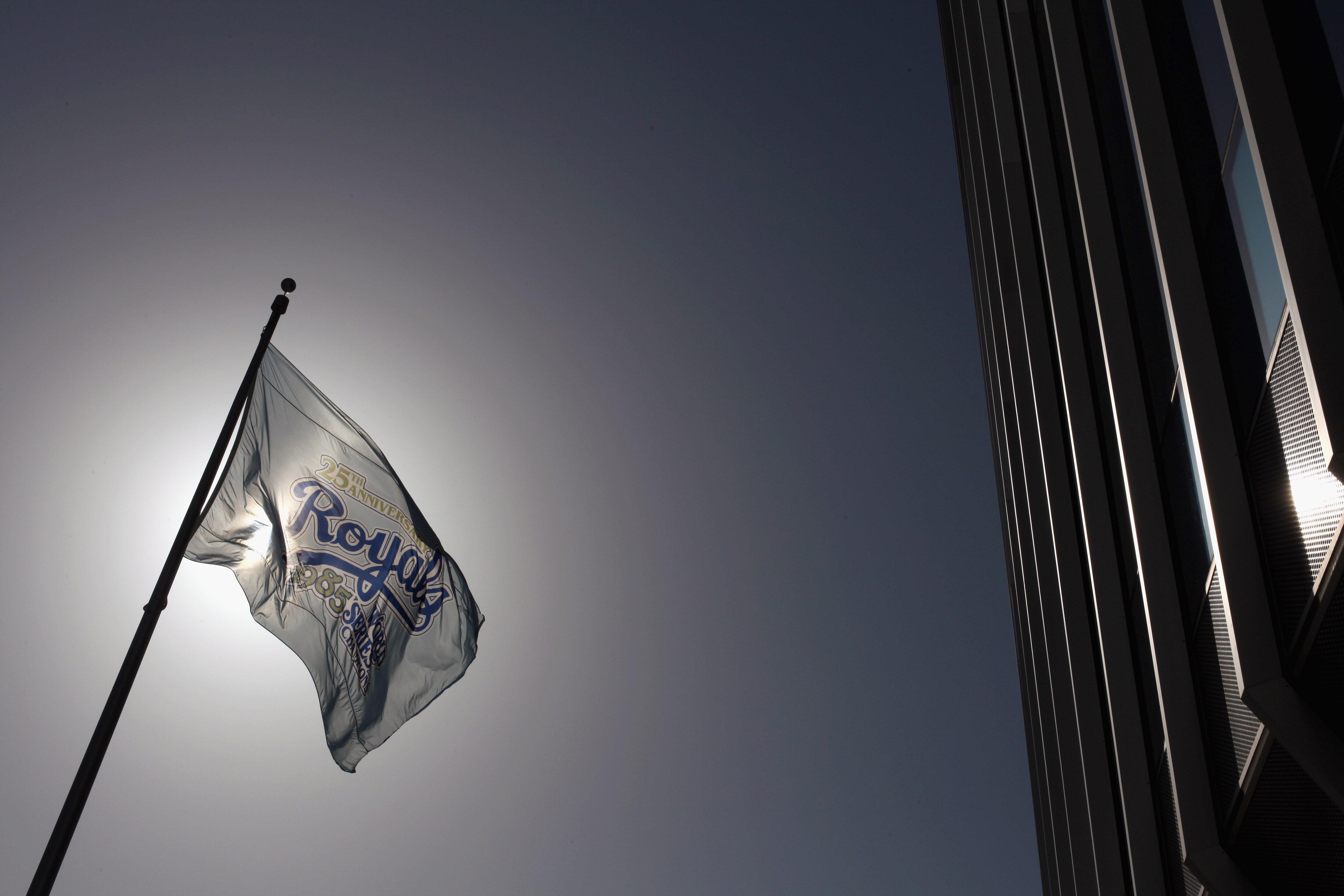 KANSAS CITY, MO - JULY 19:  A Kansas City Royals flag flies outside of Kauffman Stadium during the game between the Toronto Blue Jays and the Kansas City Royals on July 19, 2010 at Kauffman Stadium in Kansas City, Missouri.  (Photo by Jamie Squire/Getty I