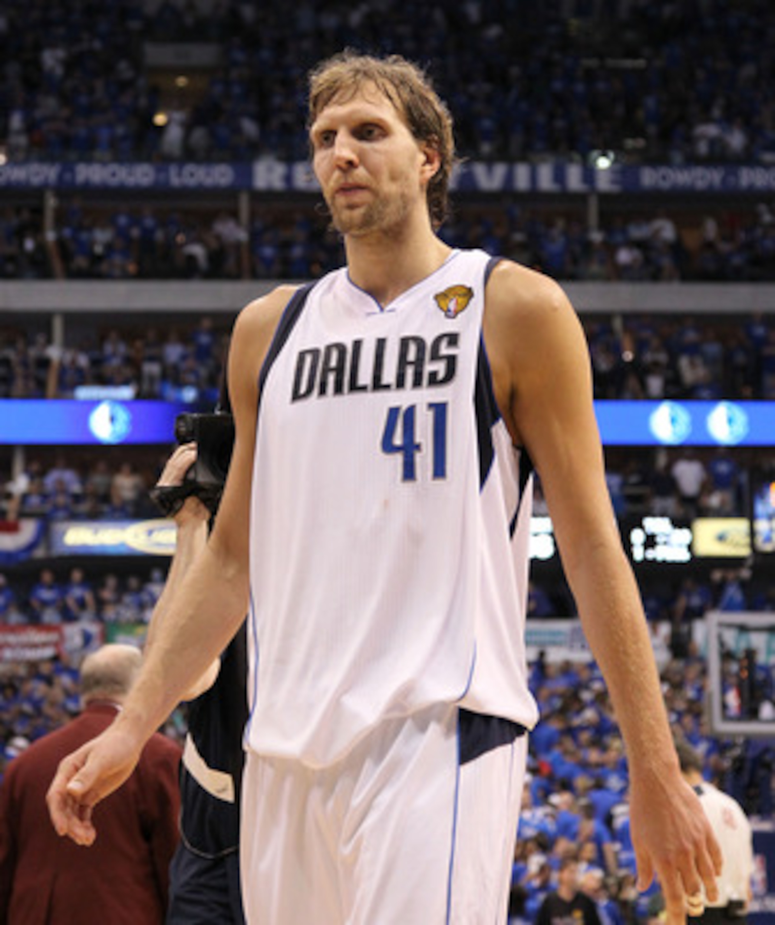 DALLAS, TX - JUNE 05:  Dirk Nowitzki #41 of the Dallas Mavericks walks off the court after being defeated 88-86 by the Miami Heat in Game Three of the 2011 NBA Finals at American Airlines Center on June 5, 2011 in Dallas, Texas.  NOTE TO USER: User expres