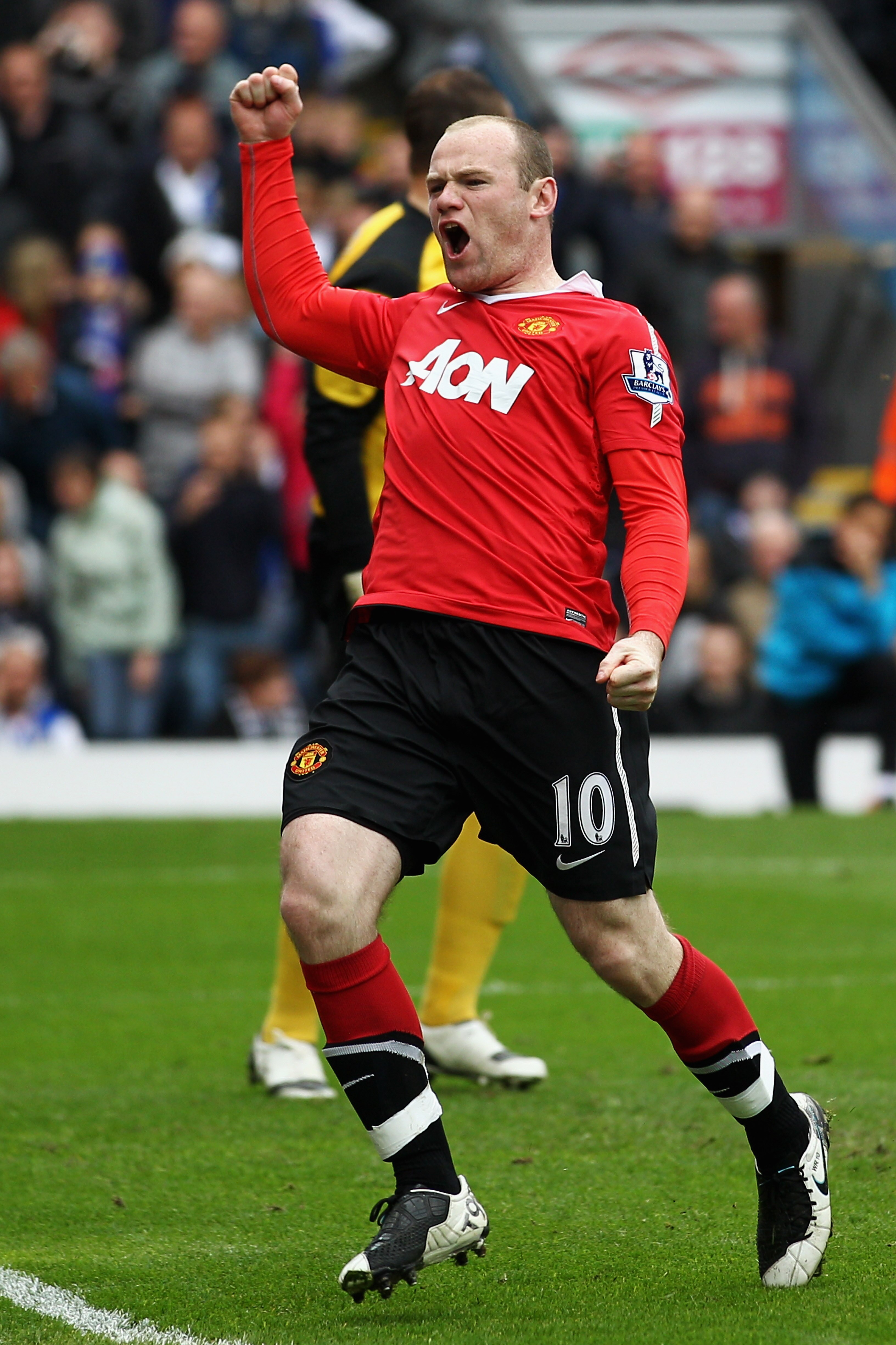 BLACKBURN, ENGLAND - MAY 14:  Wayne Rooney of Manchester United celebrates after scoring a penalty during the Barclays Premier League match between Blackburn Rovers and Manchester United at Ewood park on May 14, 2011 in Blackburn, England.  (Photo by Dean