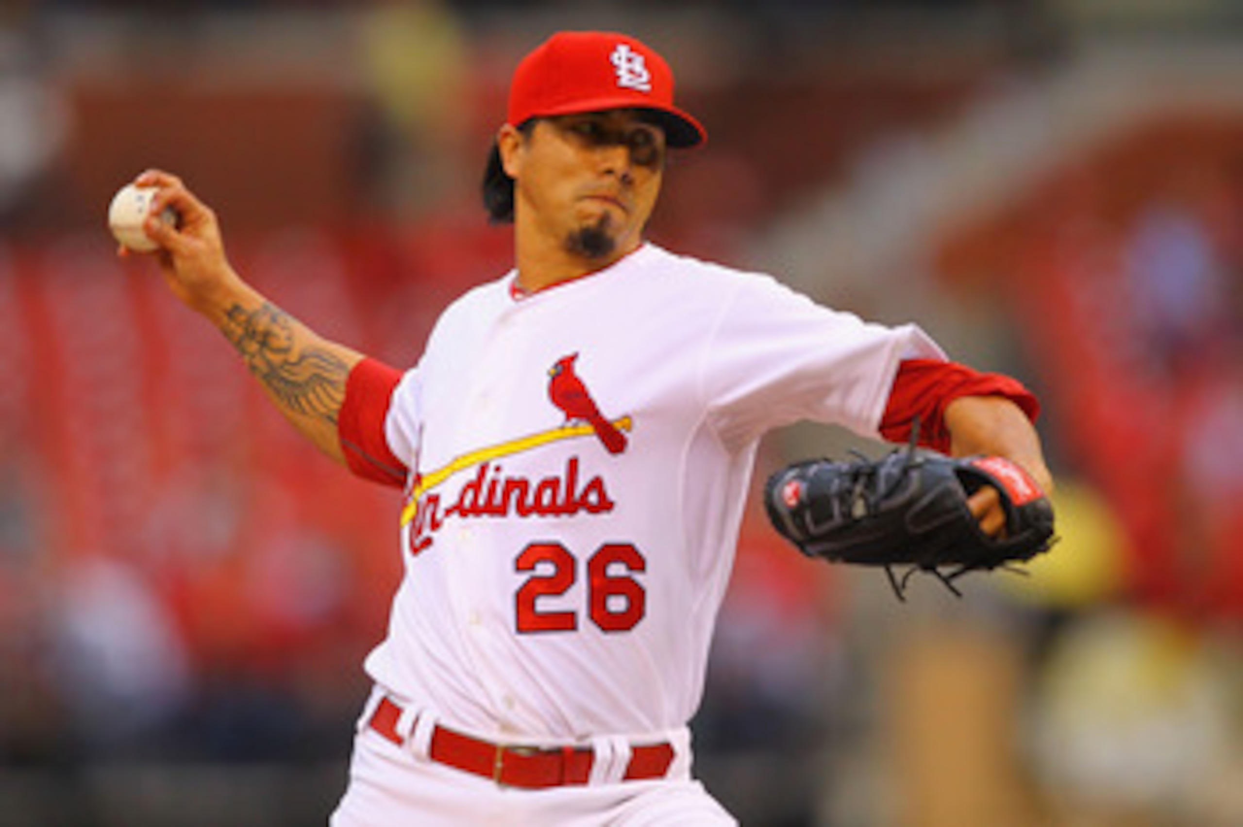 ST. LOUIS, MO - MAY 18: Starter Kyle Lohse #26 of the St.Louis Cardinals pitches against the Houston Astros at Busch Stadium on May 18, 2011 in St. Louis, Missouri.  (Photo by Dilip Vishwanat/Getty Images)