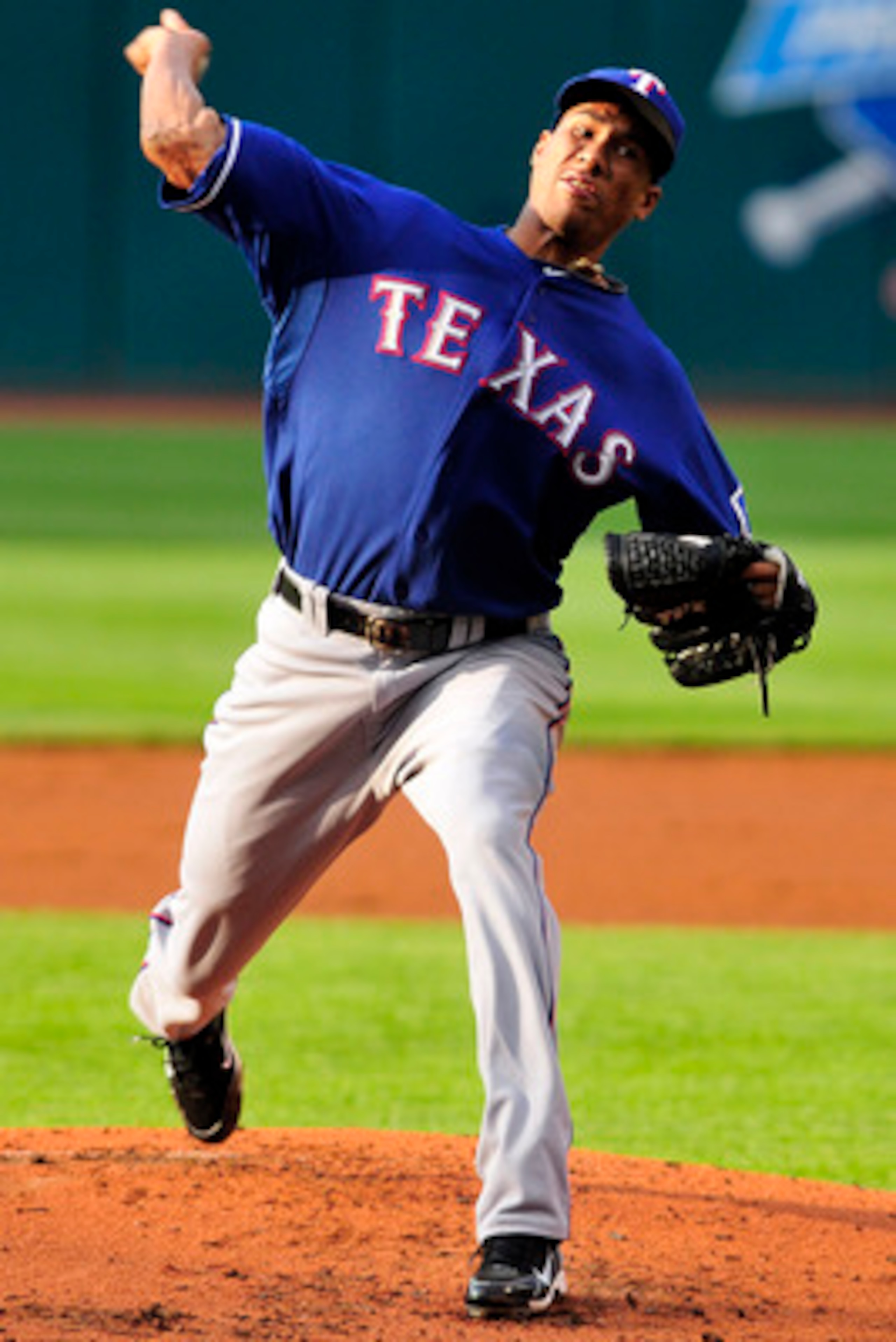 CLEVELAND, OH - JUNE 3: Alexi Ogando #41 of the Texas Rangers pitches during the first inning against the Cleveland Indians at Progressive Field on June 3, 2011 in Cleveland, Ohio.  (Photo by Jason Miller/Getty Images)