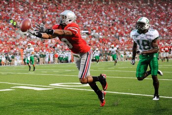 COLUMBUS, OH - SEPTEMBER 2:  DeVier Posey #8 of the Ohio State Buckeyes can't pull in this pass as Donald Brown #18 of the Marshall Thundering Herd defends at Ohio Stadium on September 2, 2010 in Columbus, Ohio.  (Photo by Jamie Sabau/Getty Images)