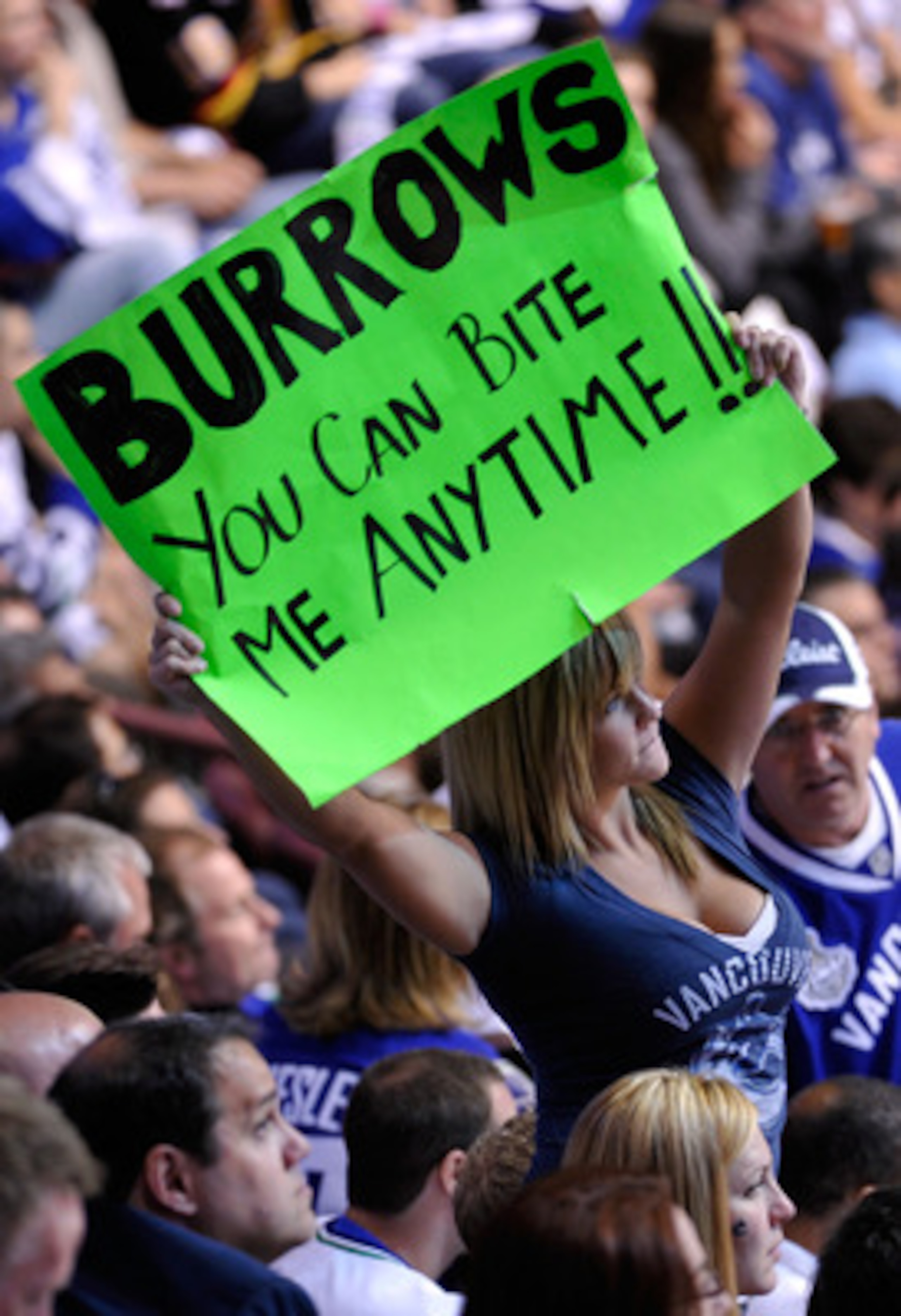 VANCOUVER, BC - JUNE 04:  A fan of the Vancouver Canucks holds a sign up that reads 'Burrows You Can Bite Me Anytime!!' during Game Two against the Boston Bruins in the 2011 NHL Stanley Cup Final at Rogers Arena on June 4, 2011 in Vancouver, British Colum