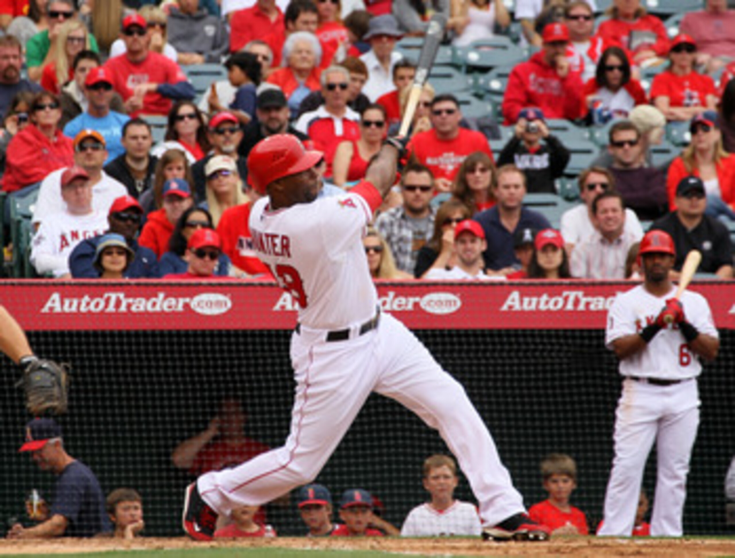 ANAHEIM, CA - MAY 22:   Torii Hunter #48 of the Los Angeles Angels of Anaheim hits a two run home run in the fouth inning against the Atlanta Braves on May 22, 2011 at Angel Stadium in Anaheim, California.   The Angels won 4-1.  (Photo by Stephen Dunn/Get