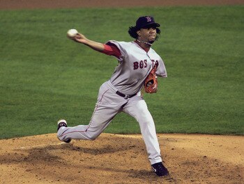 ST. LOUIS - OCTOBER 26:  Pedro Martinez #45 of the Boston Red Sox pitches against the St. Louis Cardinals during game three of the 2004 World Series on October 26, 2004 at Busch Stadium in St. Louis, Missouri. The Boston Red Sox defeated the St. Louis Car