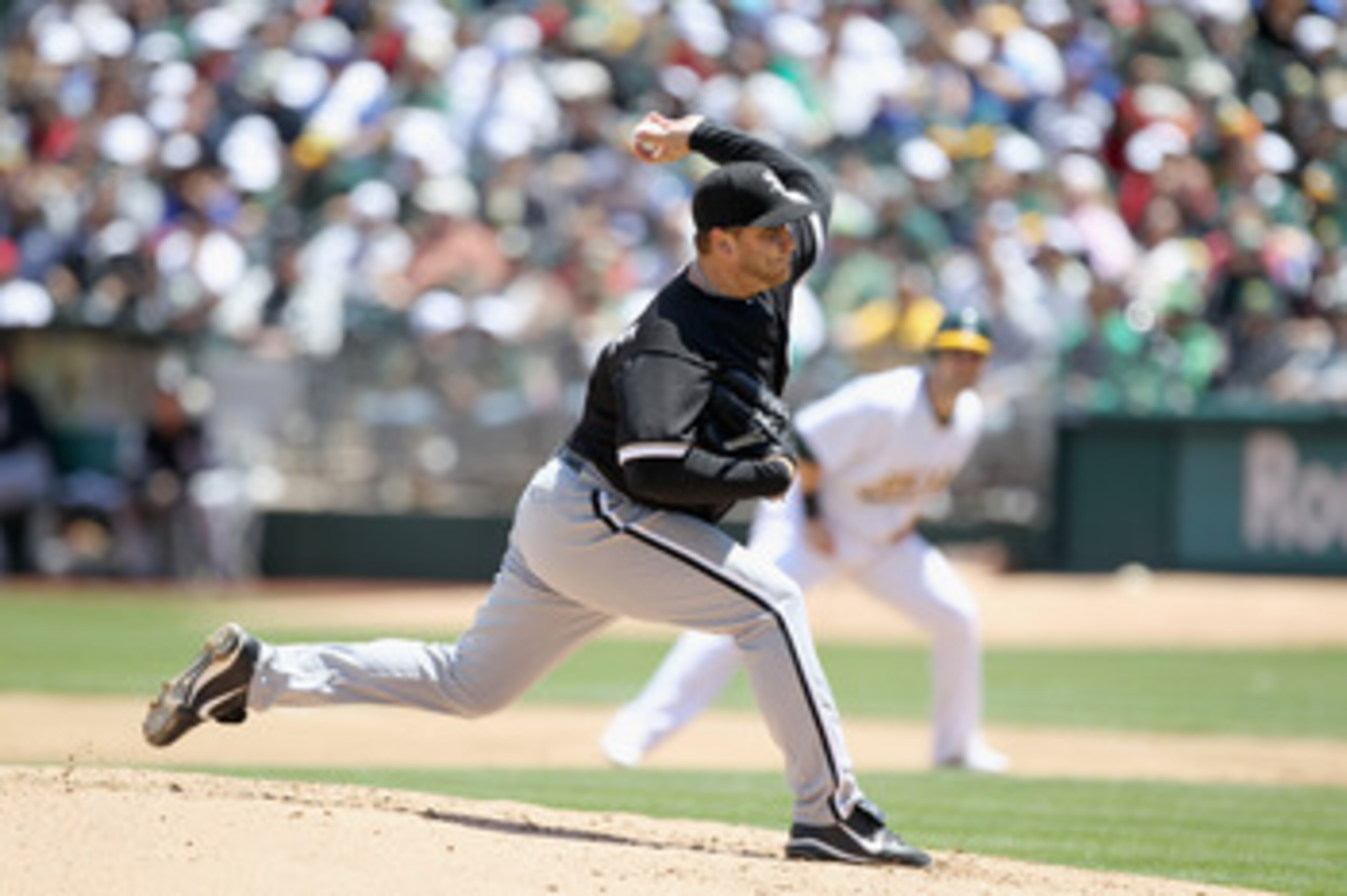 OAKLAND, CA - MAY 15:  Mark Buehrle #56 of the Chicago White Sox pitches against the Oakland Athletics at Oakland-Alameda County Coliseum on May 15, 2011 in Oakland, California.  (Photo by Ezra Shaw/Getty Images)