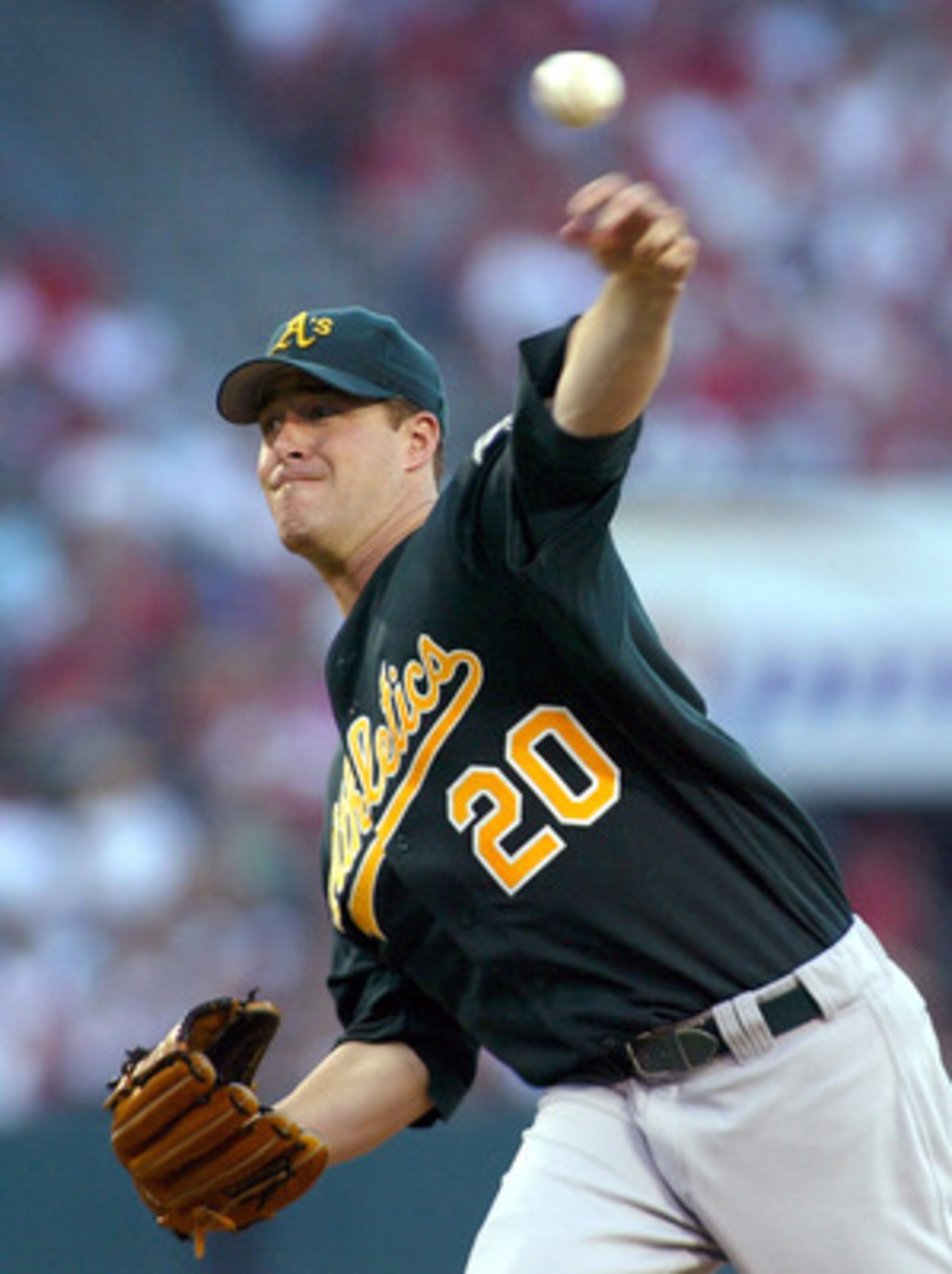 ANAHEIM, CA - SEPTEMBER 26:  Mark Mulder #20 of the Oakland Athletics pitches against the Anaheim Angels in the second inning on September 26, 2004 at Angel Stadium in Anaheim, California.  (Photo by Lisa Blumenfeld/Getty Images)