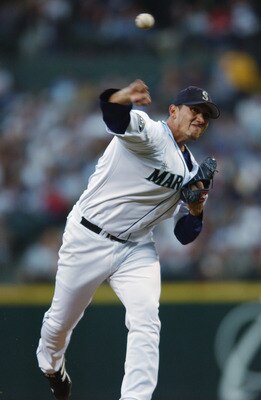 SEATTLE - AUGUST 30:  Pitcher Freddy Garcia #34 of the Seattle Mariners throws a pitch during the MLB game against the Kansas City Royals on August 30, 2002 at Safeco Field in Seattle, Washington.  The Royals defeated Mariners 5-1.  (Photo by Otto Greule