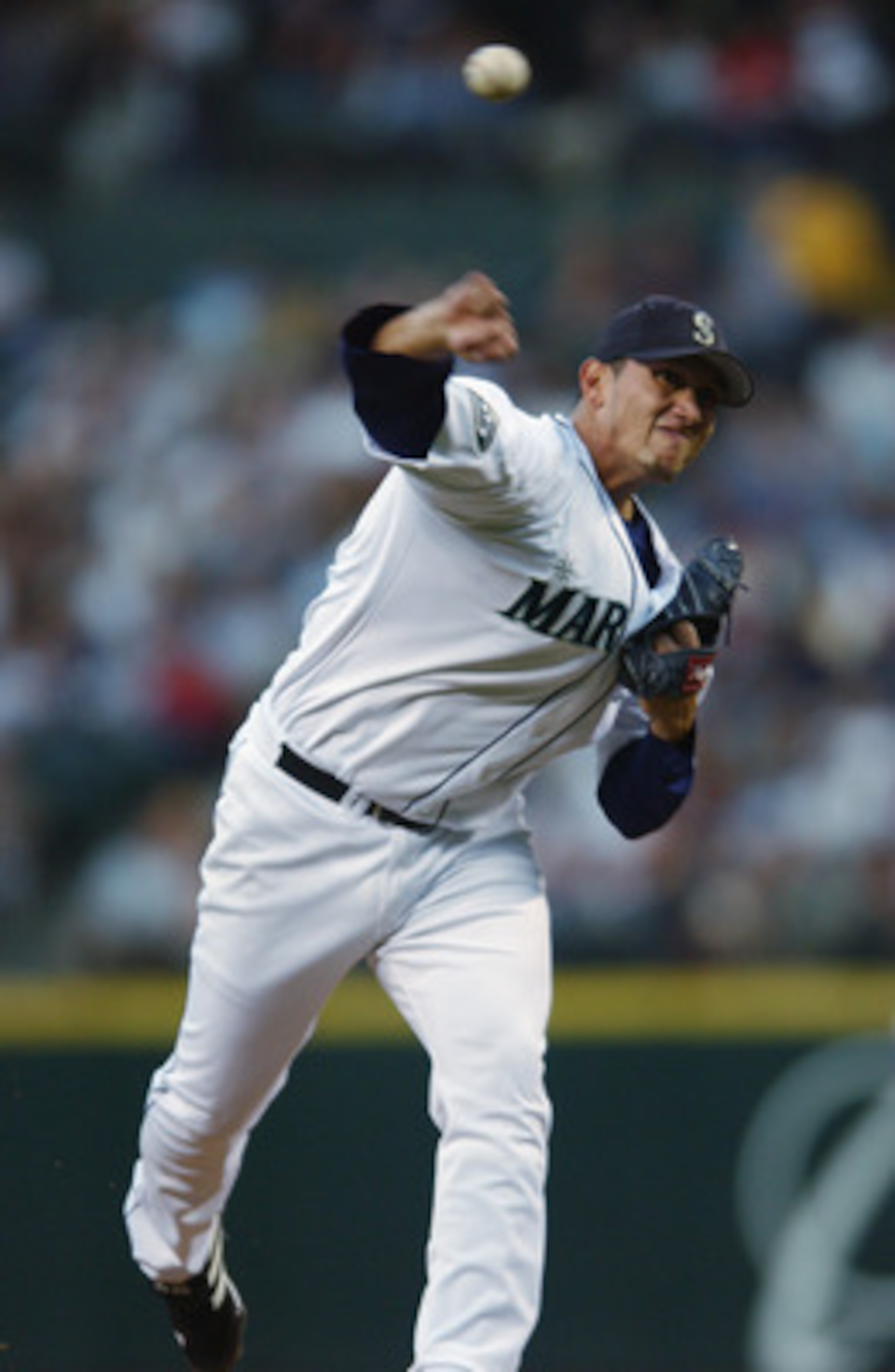 SEATTLE - AUGUST 30:  Pitcher Freddy Garcia #34 of the Seattle Mariners throws a pitch during the MLB game against the Kansas City Royals on August 30, 2002 at Safeco Field in Seattle, Washington.  The Royals defeated Mariners 5-1.  (Photo by Otto Greule