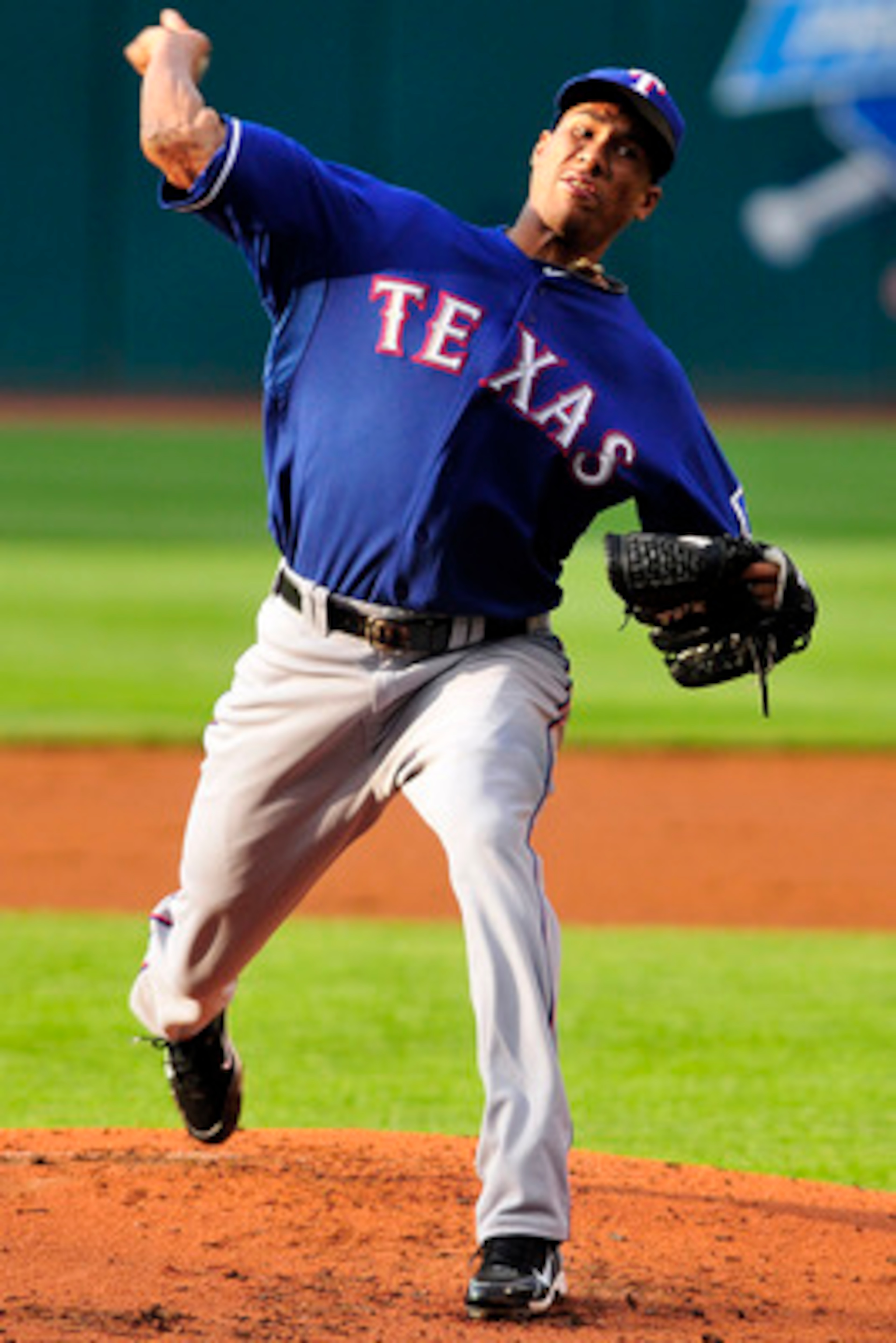 CLEVELAND, OH - JUNE 3: Alexi Ogando #41 of the Texas Rangers pitches during the first inning against the Cleveland Indians at Progressive Field on June 3, 2011 in Cleveland, Ohio.  (Photo by Jason Miller/Getty Images)